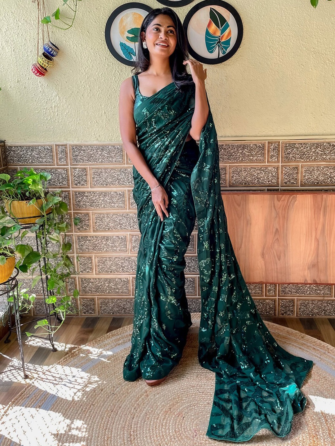 

Mitera Green Embellished Sequinned Pure Georgette Saree