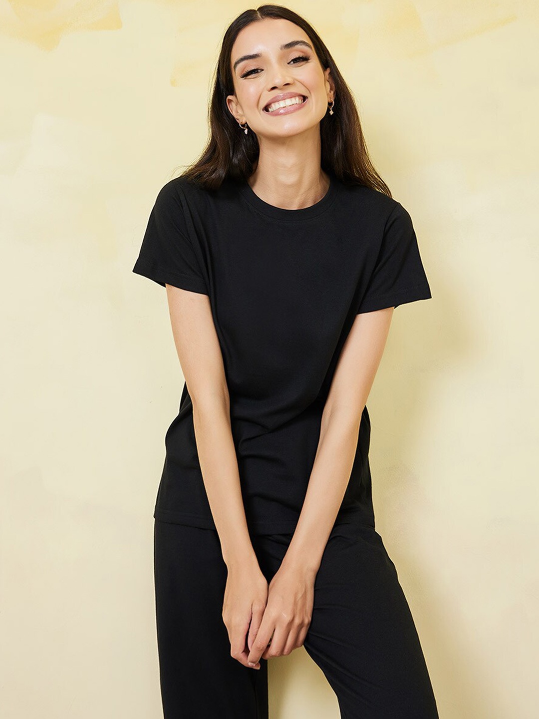 

Styli Women Black Solid Night suit