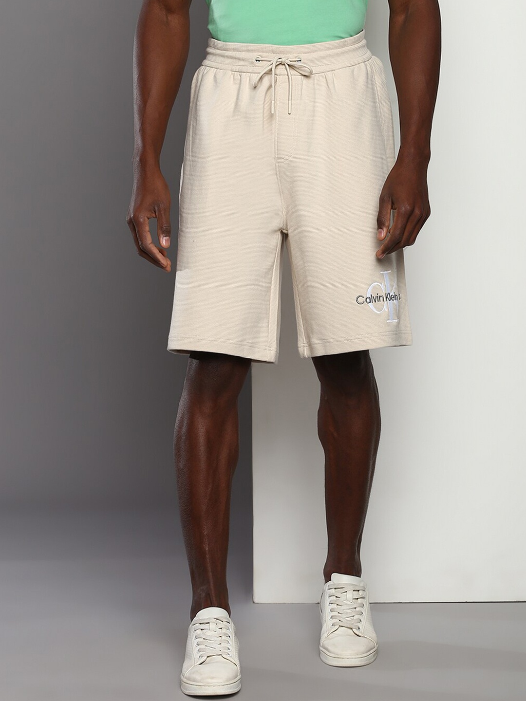 

Calvin Klein Jeans Men Mid-Rise Regular Fit Shorts, Beige