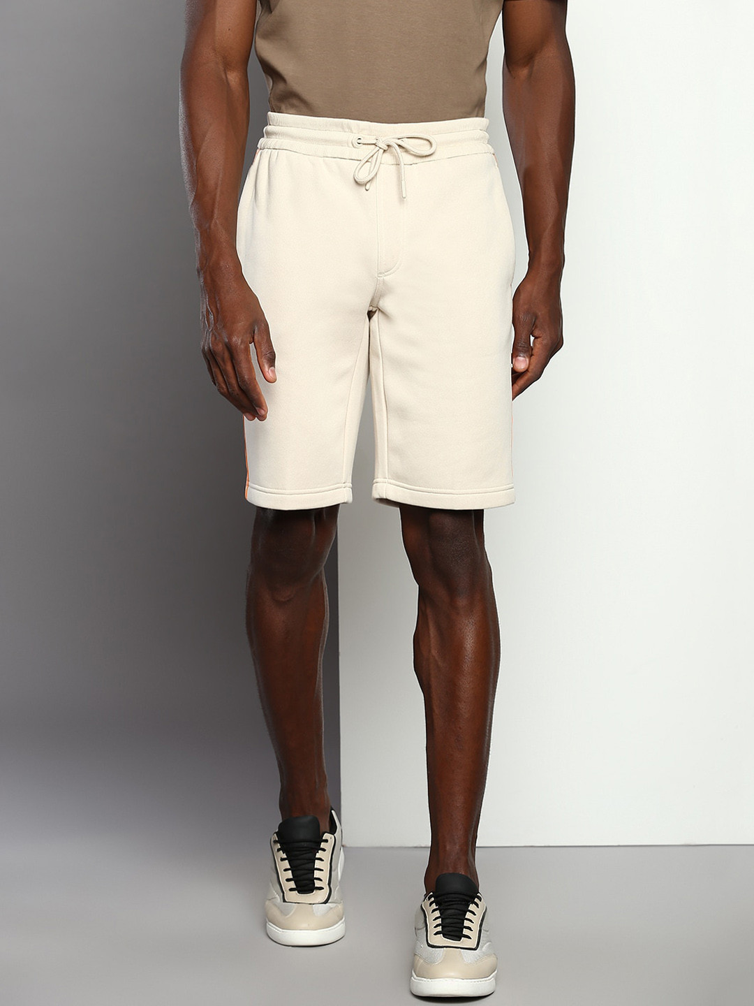 

Calvin Klein Jeans Men Mid-Rise Regular Fit Shorts, Beige