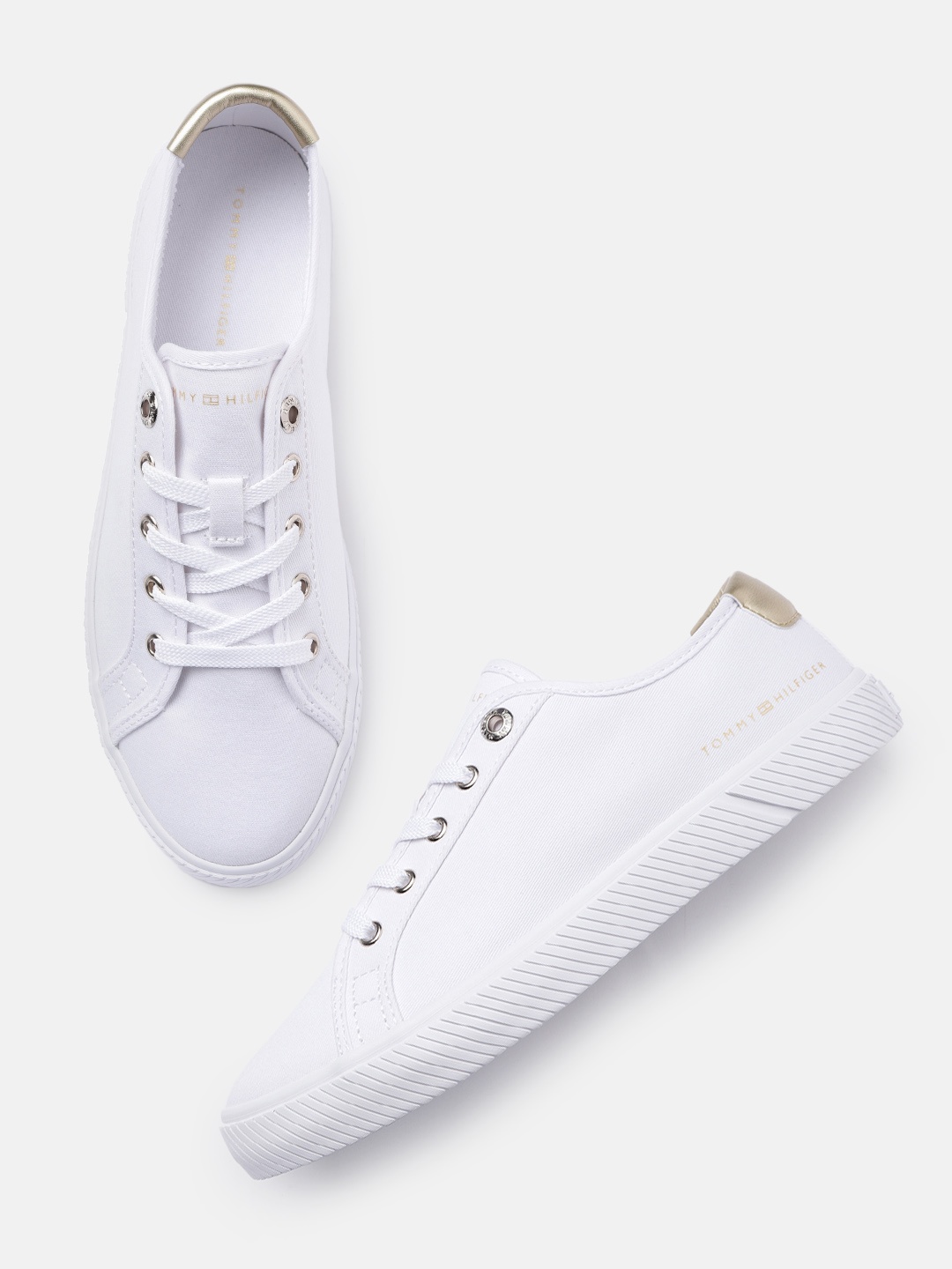 

Tommy Hilfiger Women Solid Sneakers, White