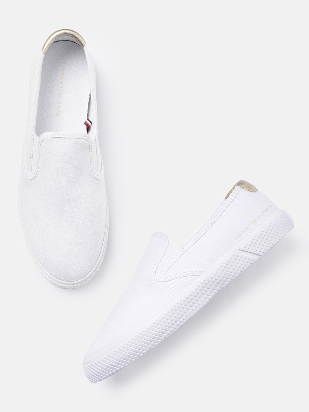 

Tommy Hilfiger Women Solid Slip-On Sneakers, White