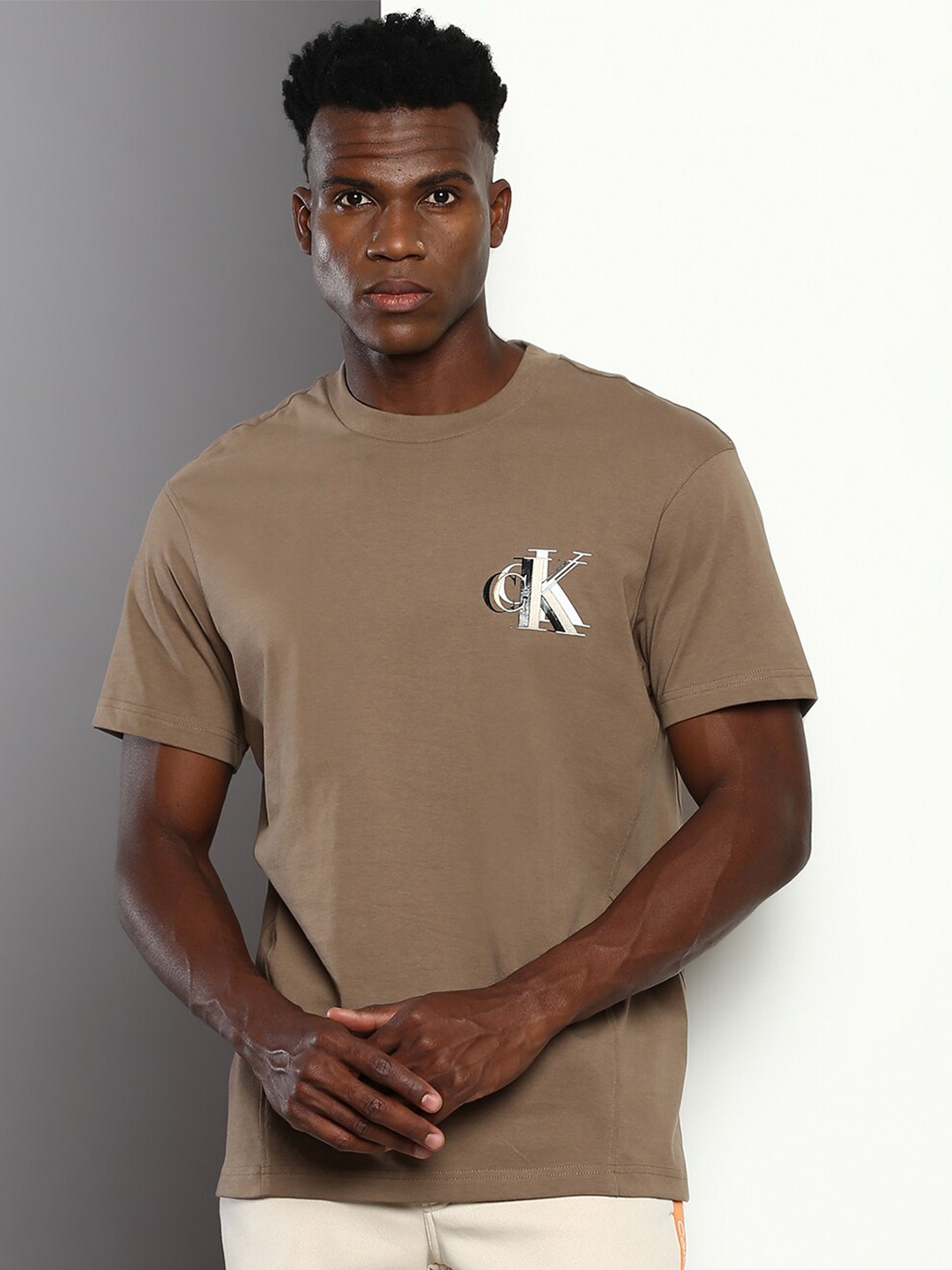 

Calvin Klein Jeans Brand Logo Printed Round Neck Relaxed Fit T-shirt, Brown