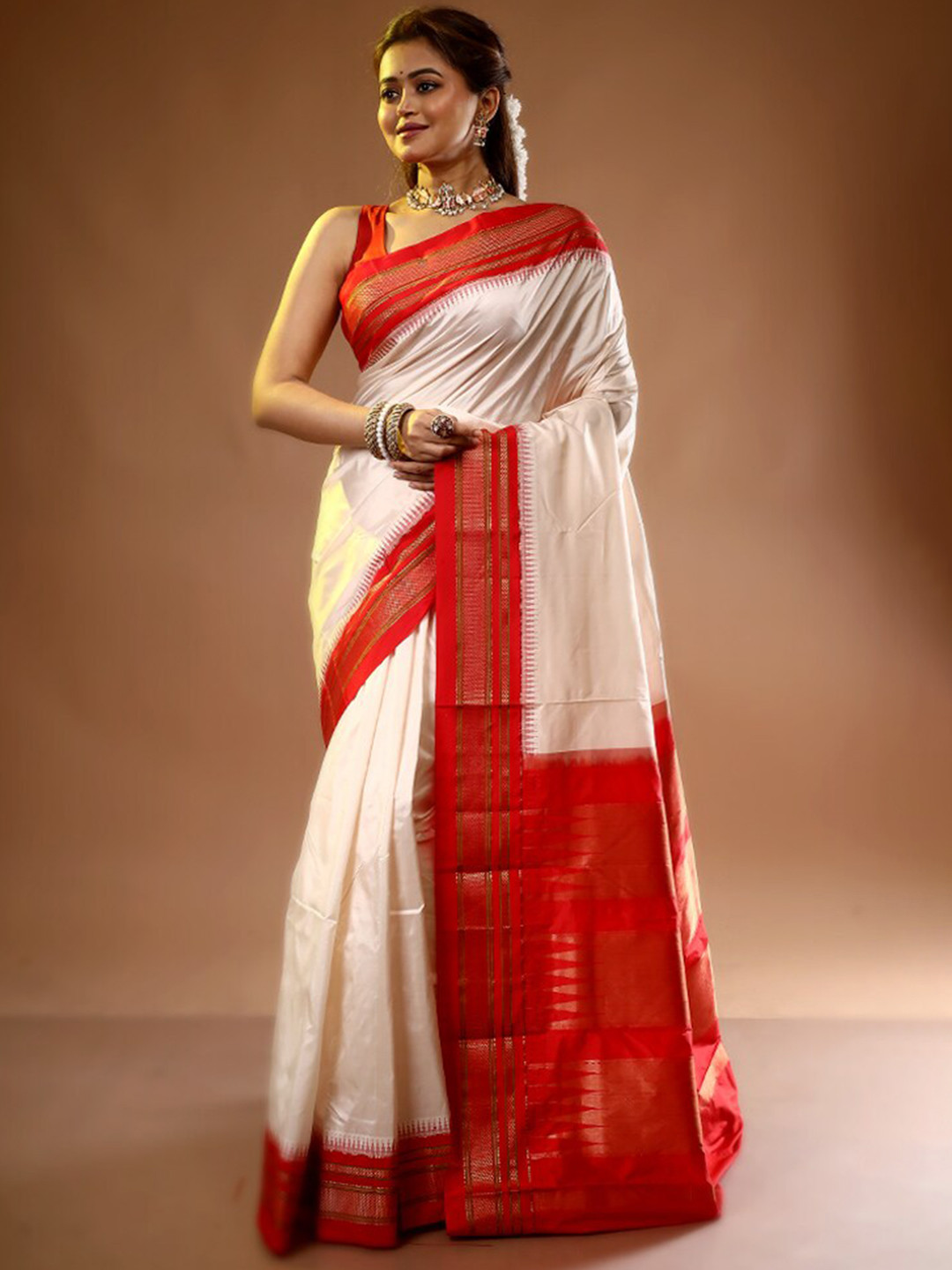 

AllSilks Off White & Red Zari Pure Silk Kanjeevaram Saree