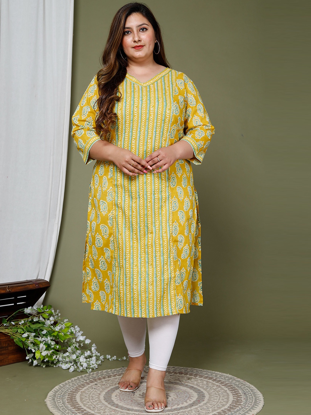 

Swasti Ethnic Motif Printed V Neck Pure Cotton Kurta, Yellow