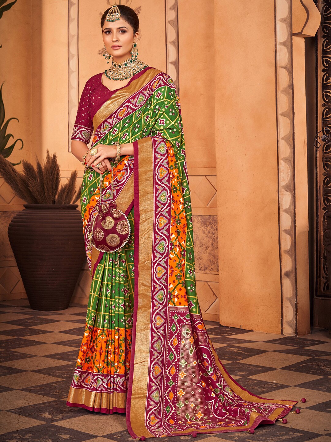 

Anouk Green & Maroon Ethnic Motifs Printed Zari Patola Saree