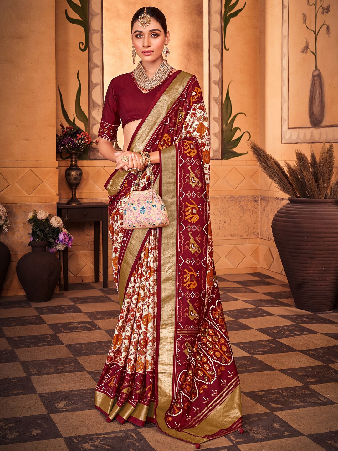 

Anouk Ethnic Motifs Zari Silk Blend Patola Saree, Off white