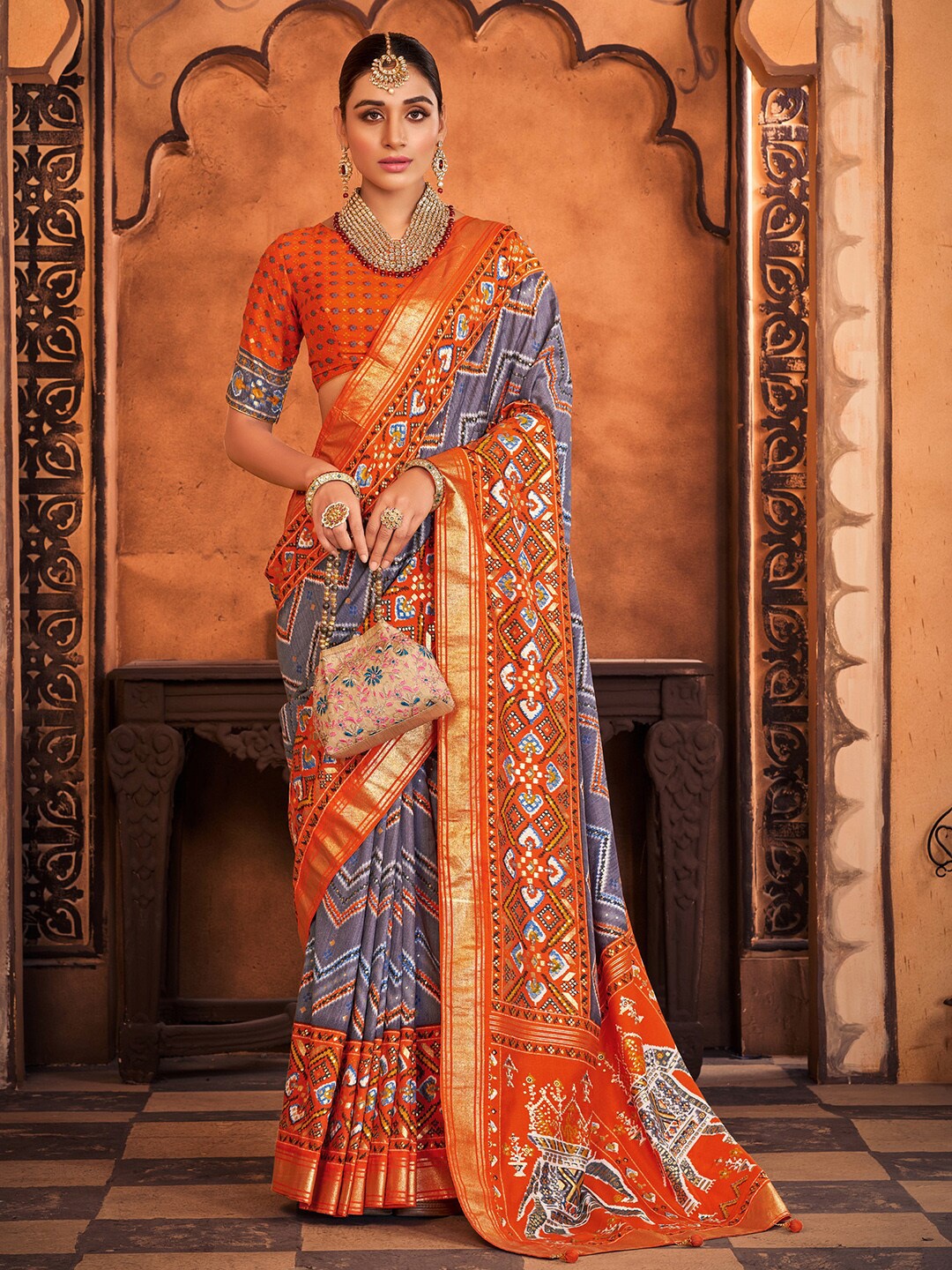 Anouk Grey & Orange Ethnic Motifs Printed Zari Patola Saree