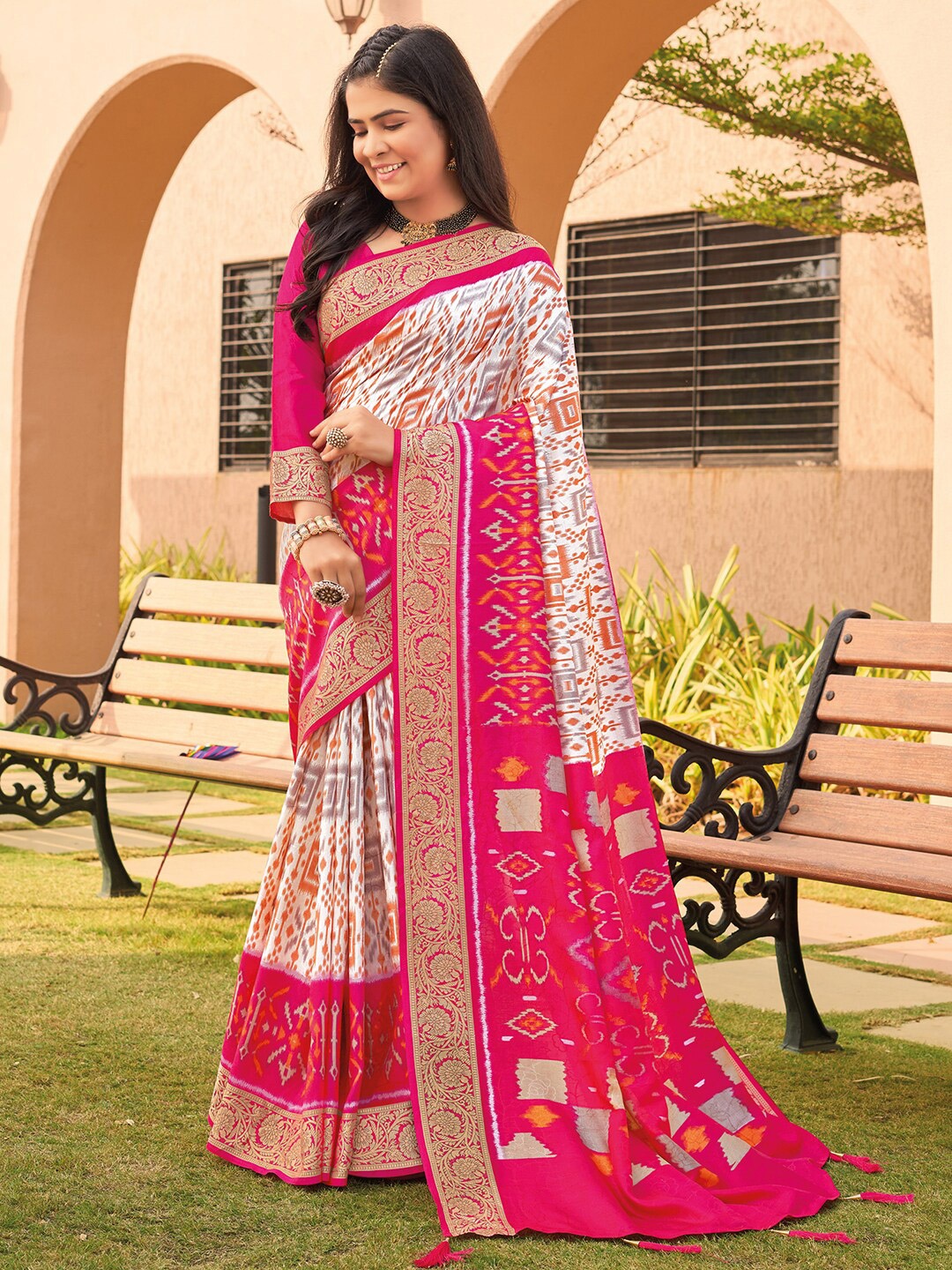 

Anouk White & Pink Ethnic Motifs Printed Zari Pochampally Saree