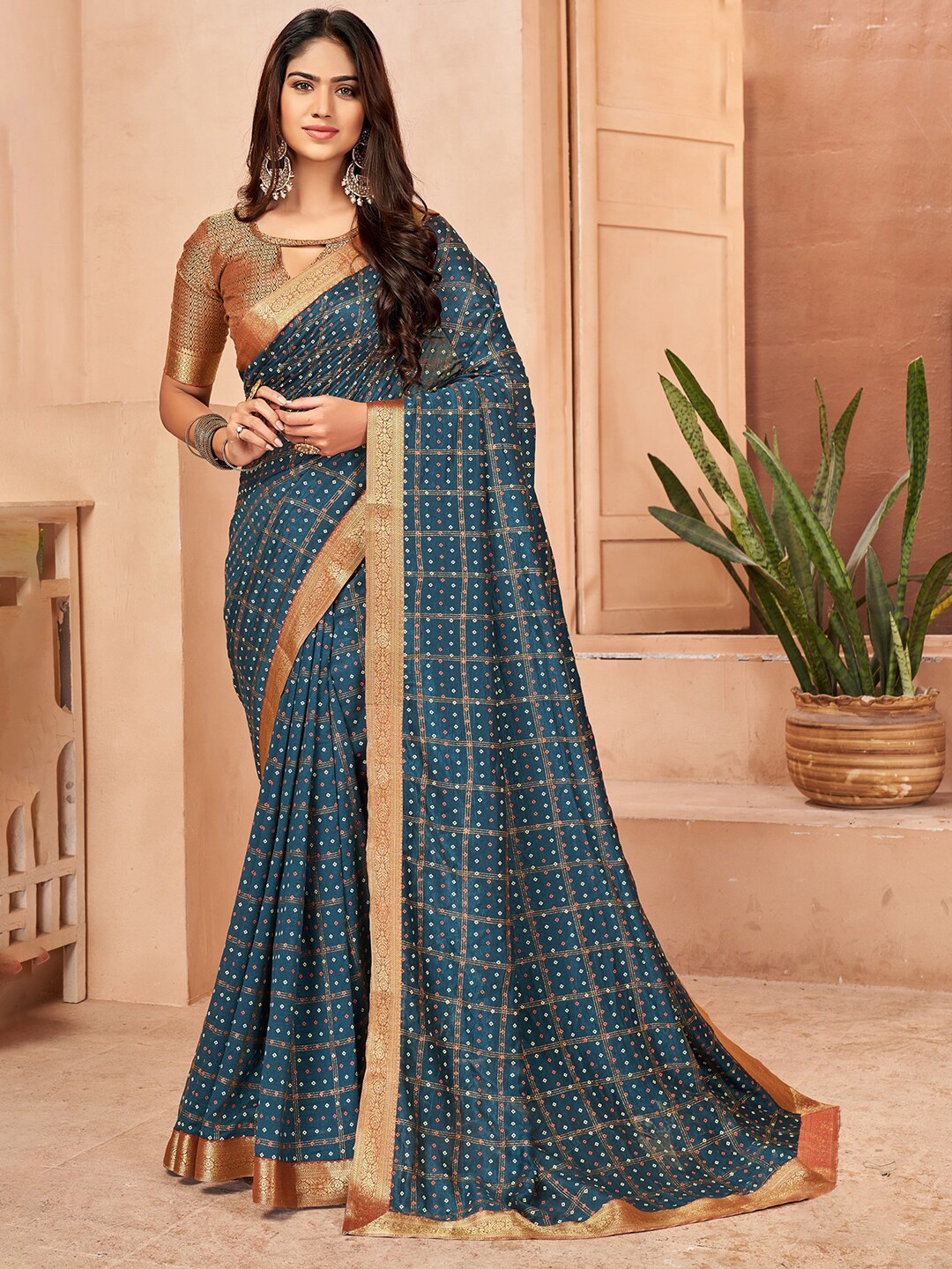 

Anouk Teal & Gold Bandhani Printed Zari Saree