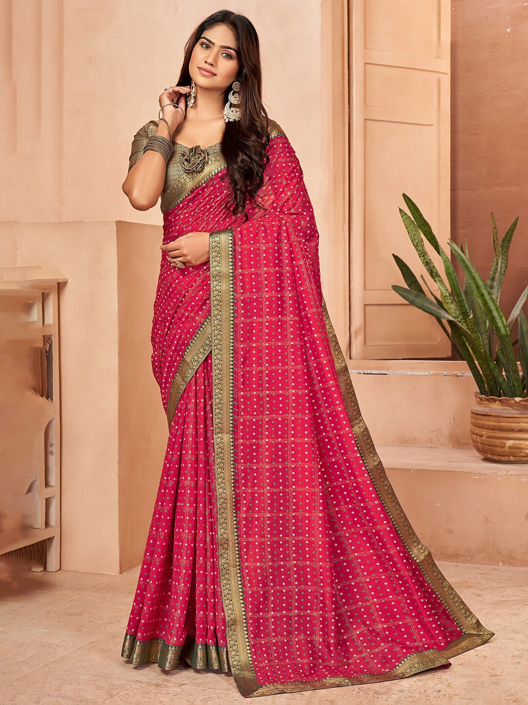

Anouk Pink & White Bandhani Printed Zari Saree