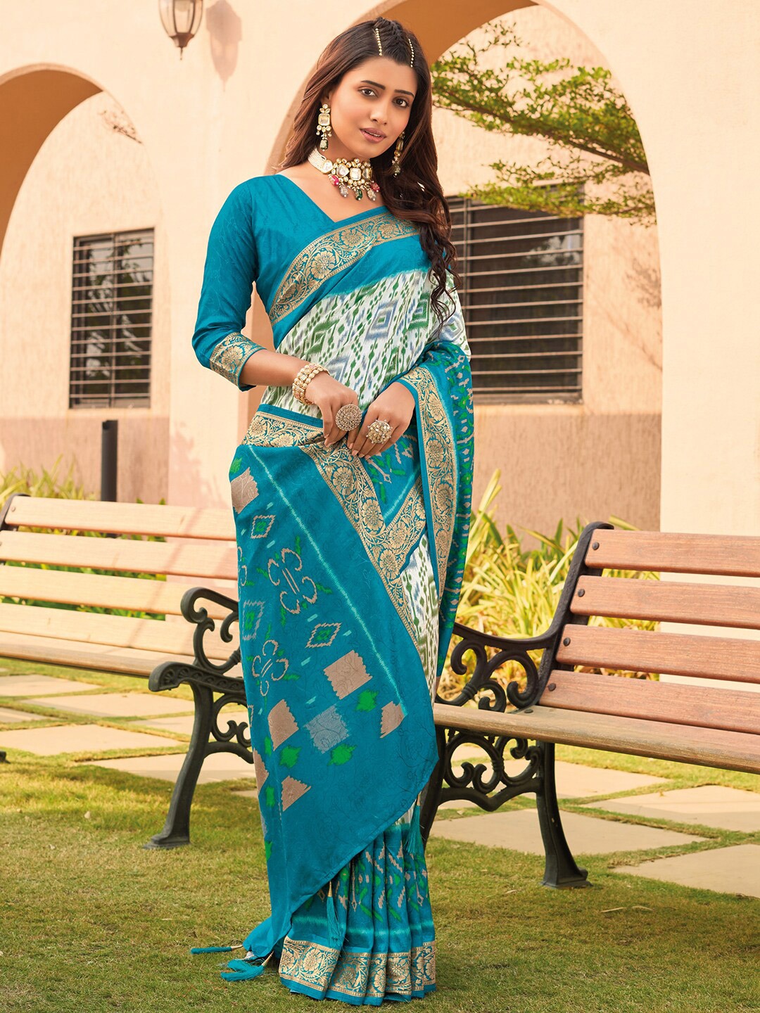 

Anouk White & Blue Printed Ethnic Motif Zari Pochampally Saree
