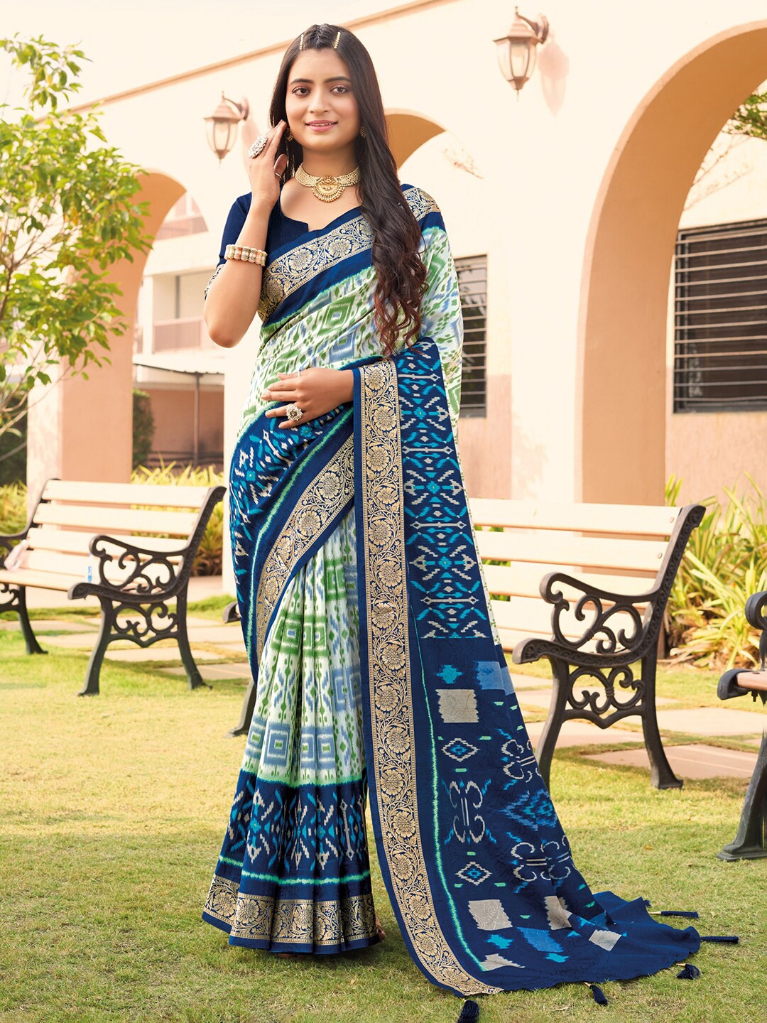 

Anouk Ethnic Motifs Printed Zari Pochampally Saree, White