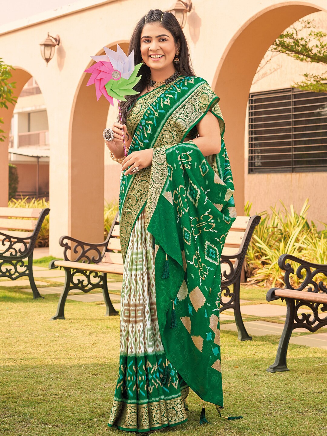 

Anouk White & Green Ethnic Motifs Printed Zari Pochampally Saree