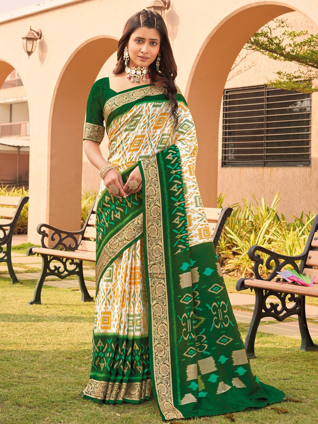 

Anouk White & Green Ethnic Motifs Printed Zari Pochampally Saree