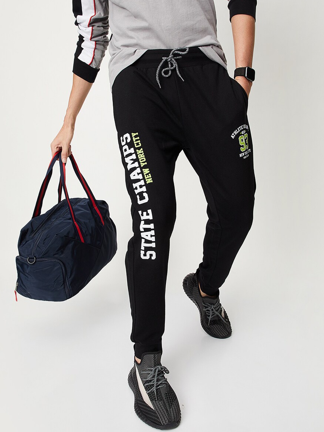 

max Men Typography Printed Regular Fit Mid-Rise Joggers, Black