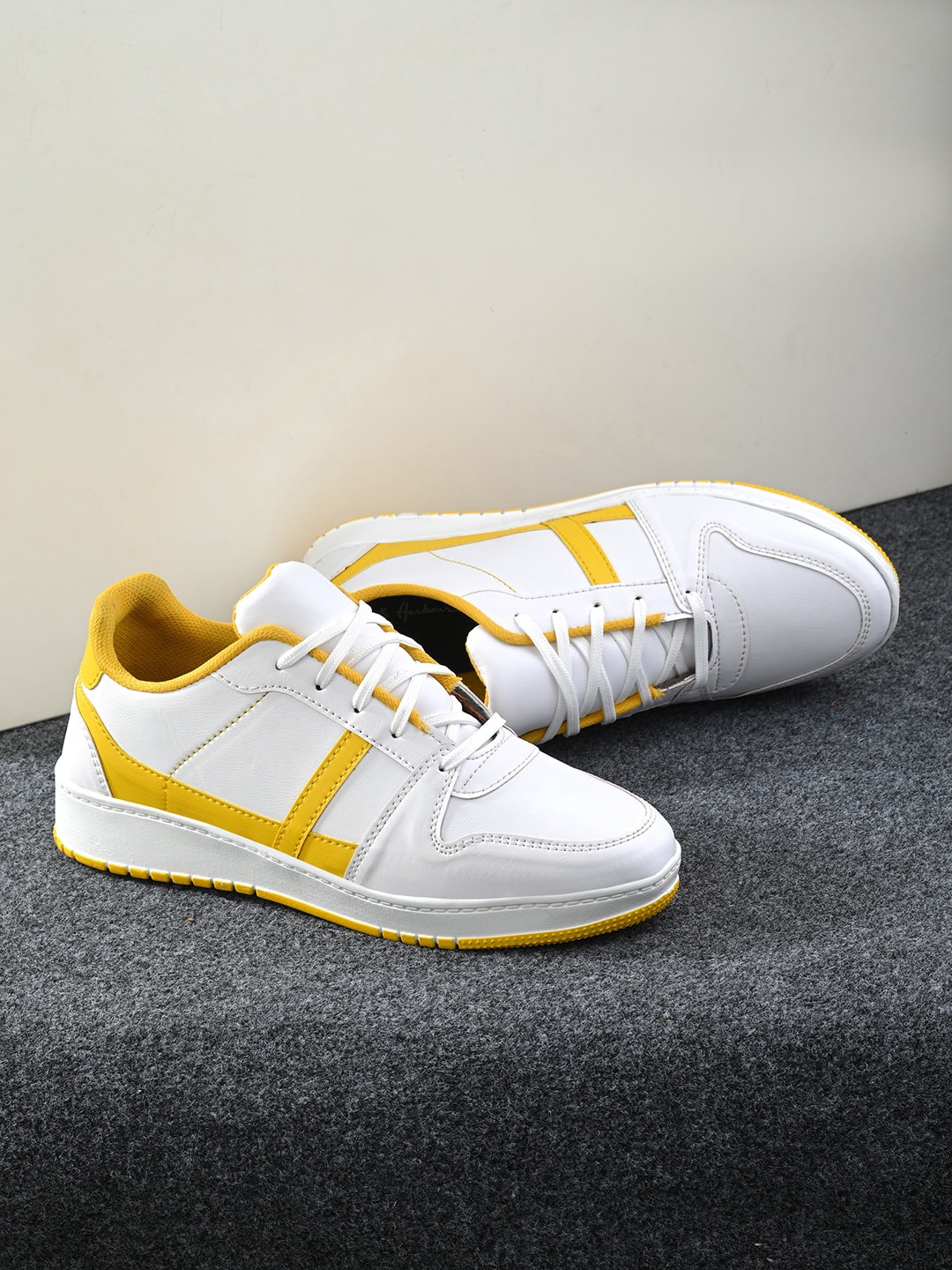 

Mast & Harbour Men White And Yellow Colourblocked Sneakers