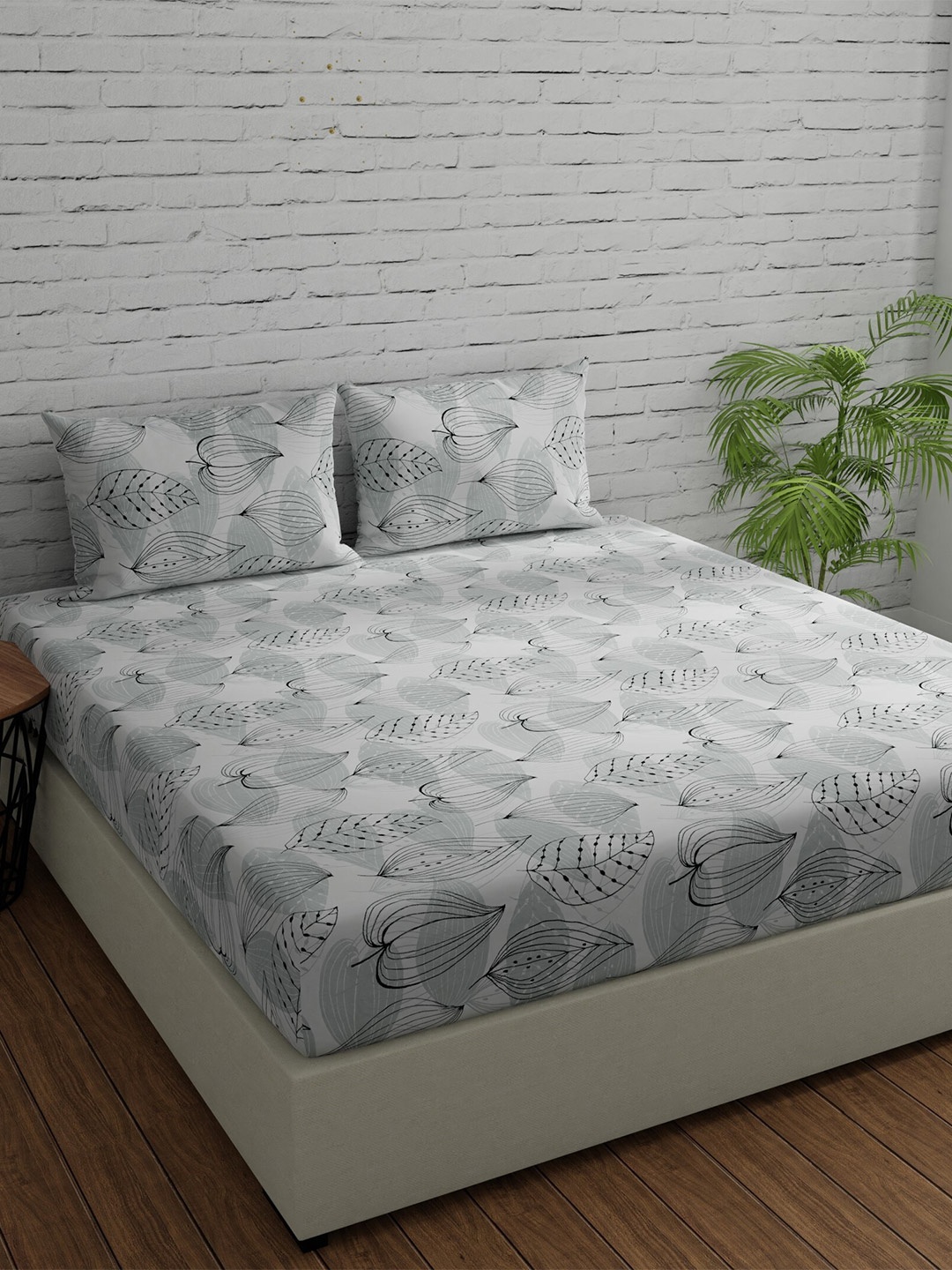 

Huesland Comfort Grey Floral Printed 144 TC Cotton King Bedsheet & 2 Pillow Covers