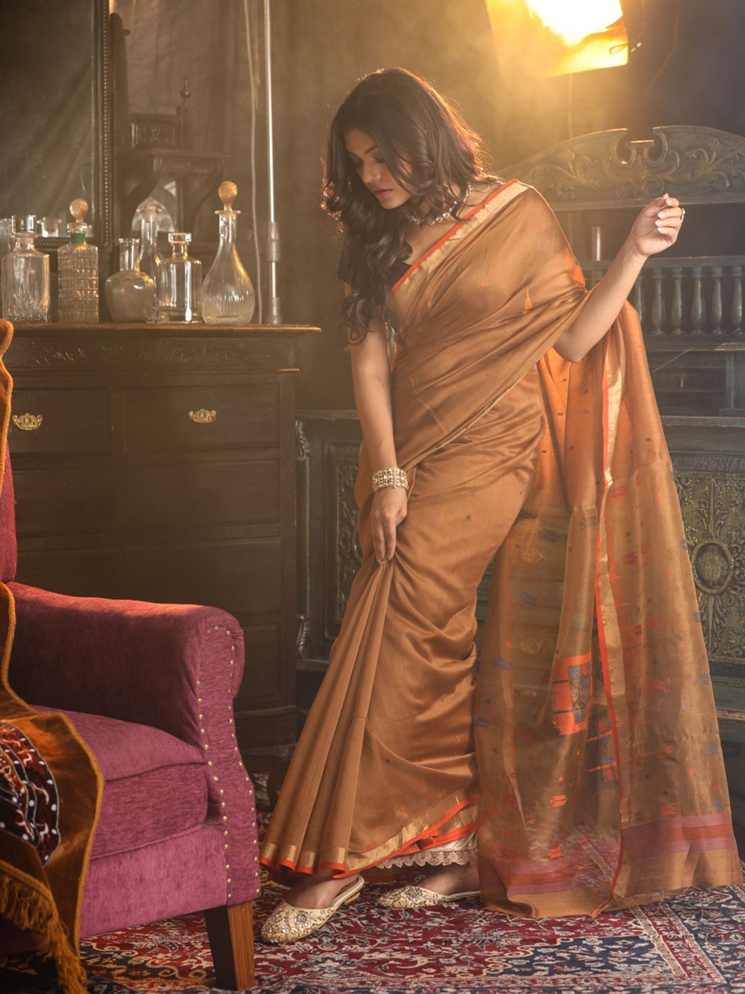 

Mitera Brown & Gold-Toned Ethnic Motifs Woven Design Zari Silk Cotton Saree