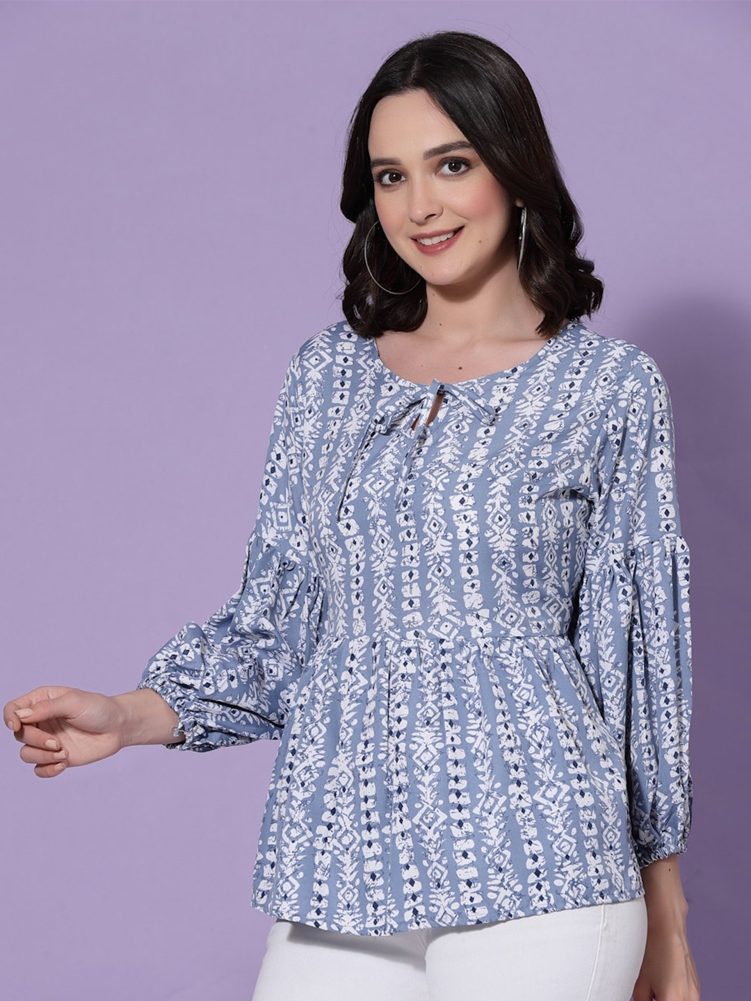 

Oomph! Ethnic Motifs Printed Tie Up Neck Gathered Puff Sleeves Peplum Top, Blue