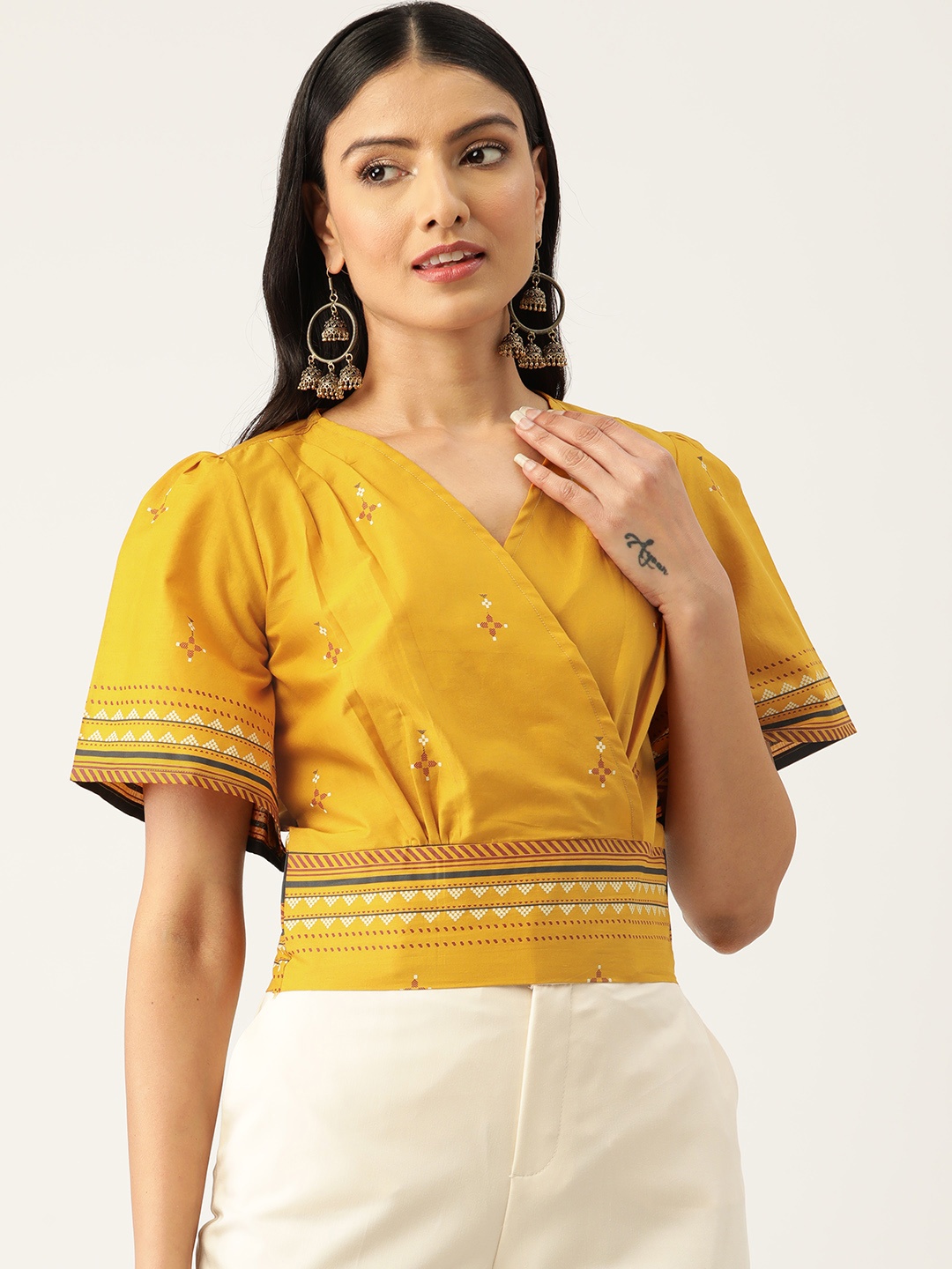 

ZIZO By Namrata Bajaj Ethnic Motifs Print Flared Sleeves Pure Cotton Blouson Crop Top, Mustard