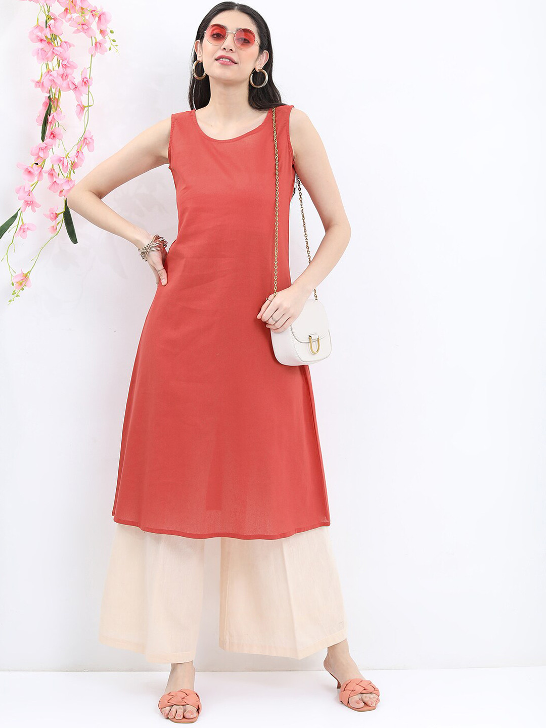 

Vishudh Rust Orange Round Neck Sleeveless Cotton Kurta