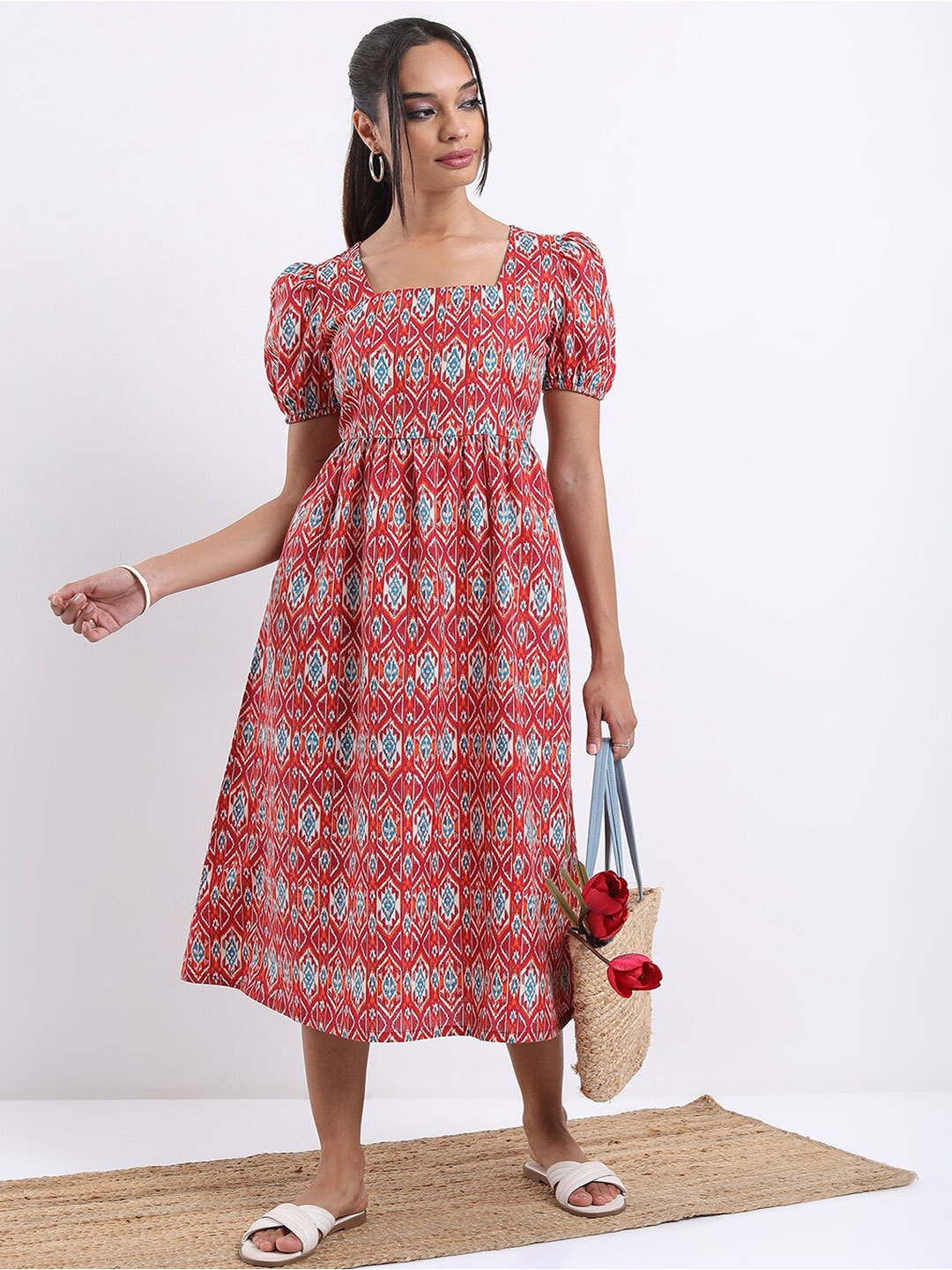 

Vishudh Rust Ethnic Motifs Printed Square Neck Midi A-Line Dress