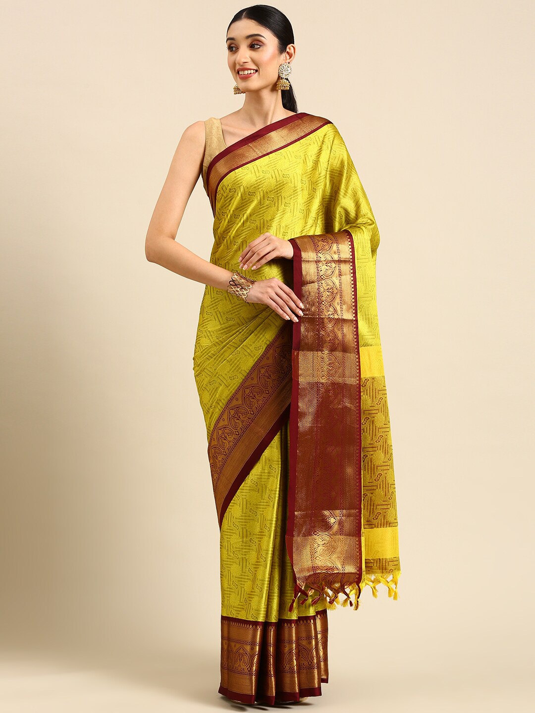 

Anouk Olive Ethnic Motif Woven Design Zari Kanjeevaram Saree