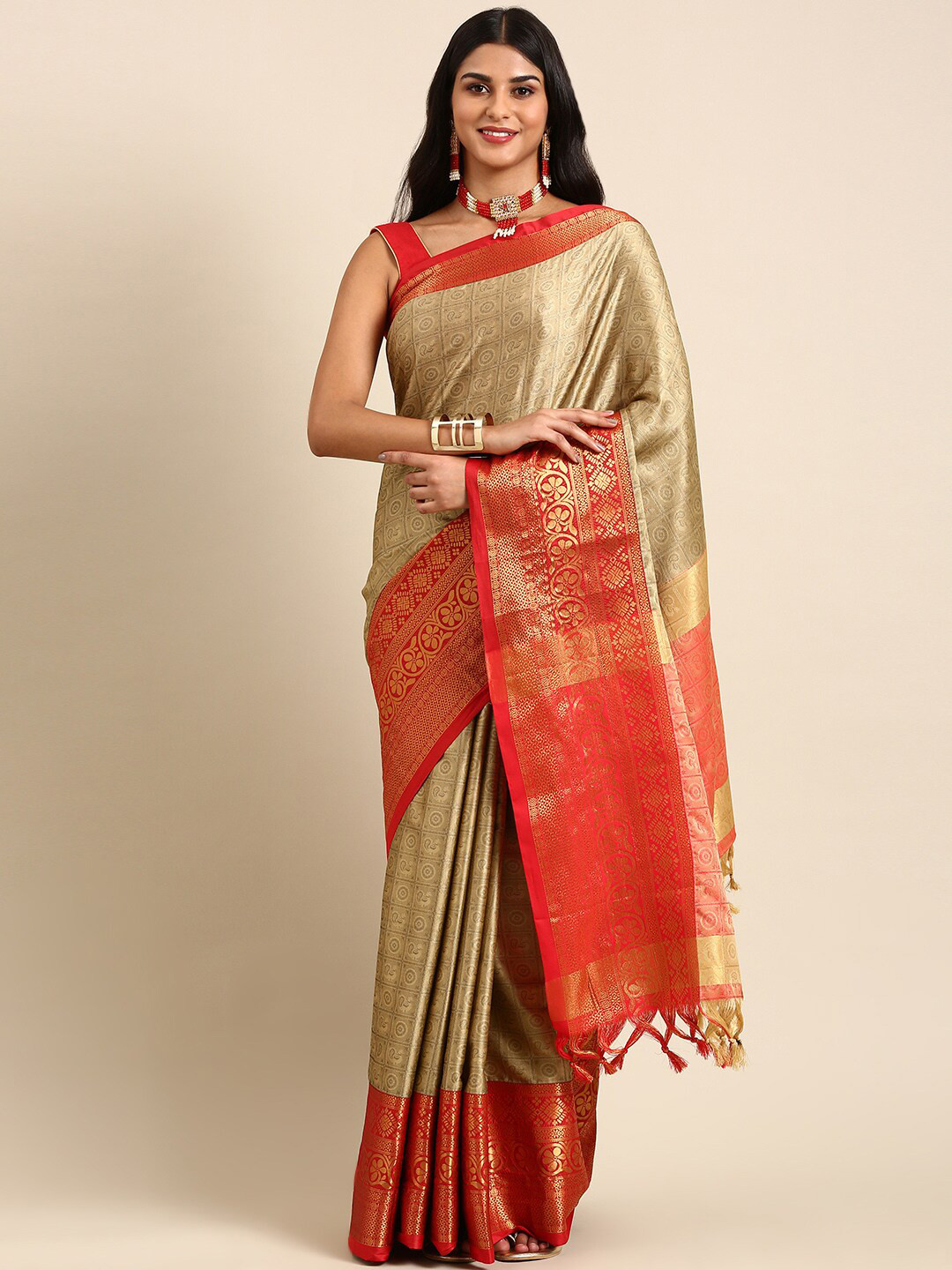 

Anouk Beige & Red Ethnic Motif Woven Design Zari Kanjeevaram Saree