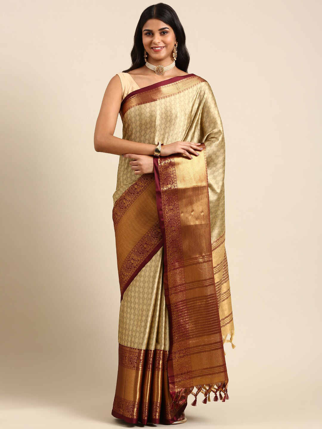 

Anouk Beige & Coffee Brown Woven Design Zari Silk Blend Kanjeevaram Saree