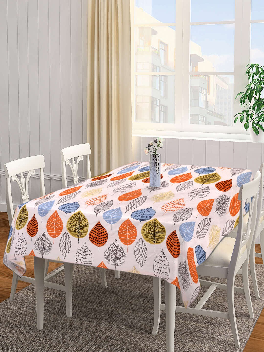 

Arrabi Peach Colored & Blue Leaf Printed 6-Seater Table Cover