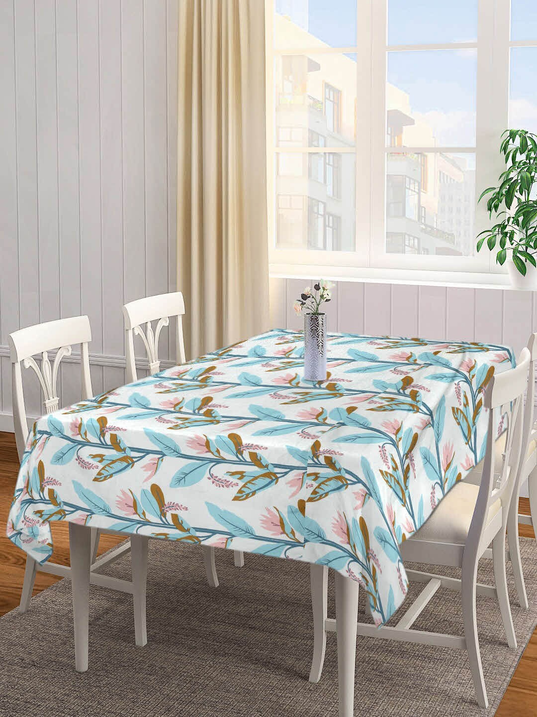 

Arrabi White & Aqua Blue Leaf Printed 6-Seater Table Cover