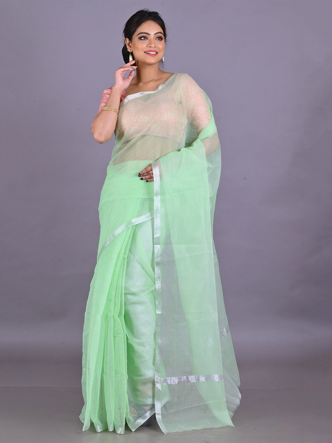 

Unnati Silks Green & Silver-Toned Zari Pure Cotton Kota Saree
