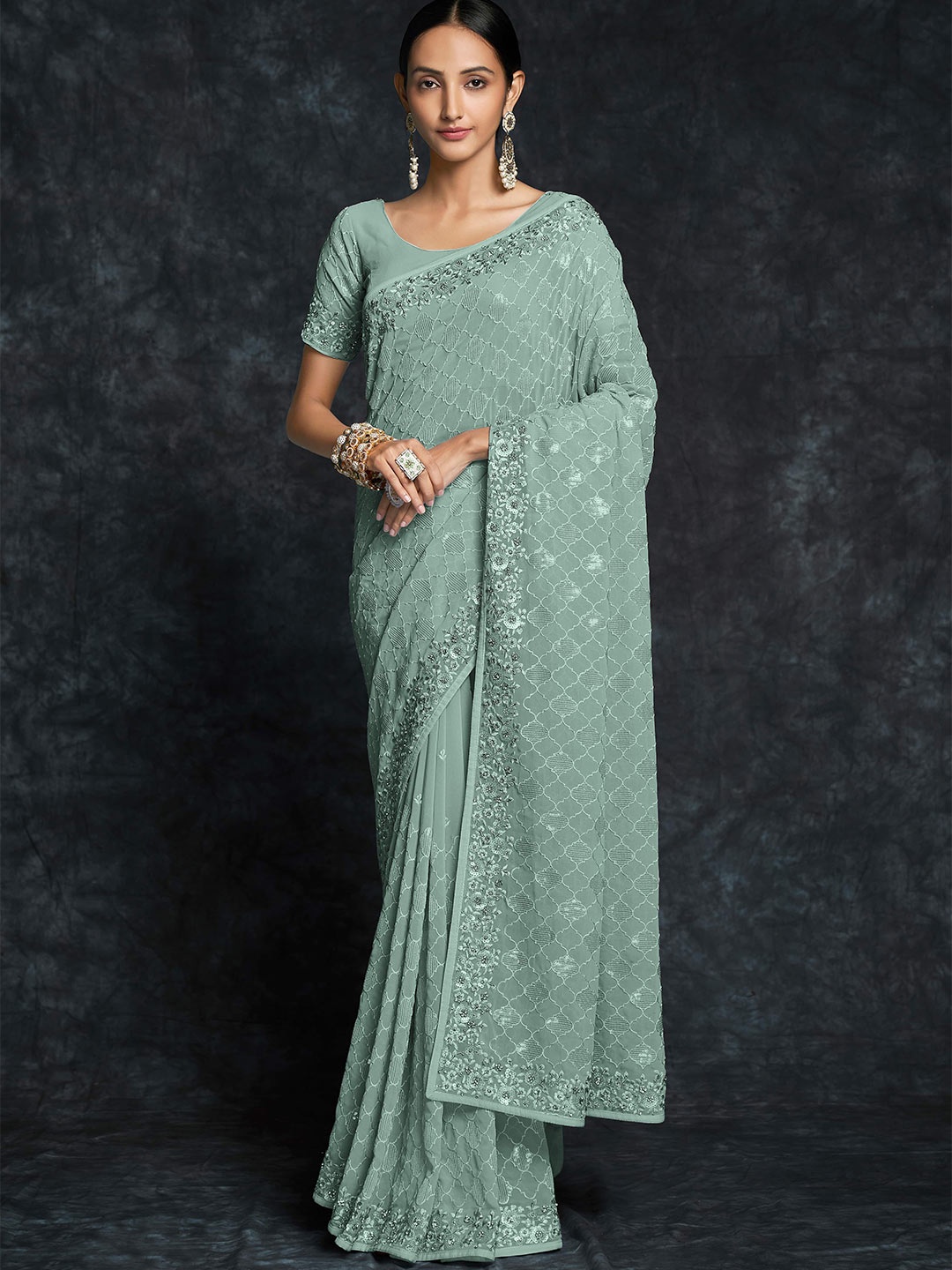 

Fusionic Embellished Sequinned Pure Georgette Saree, Green