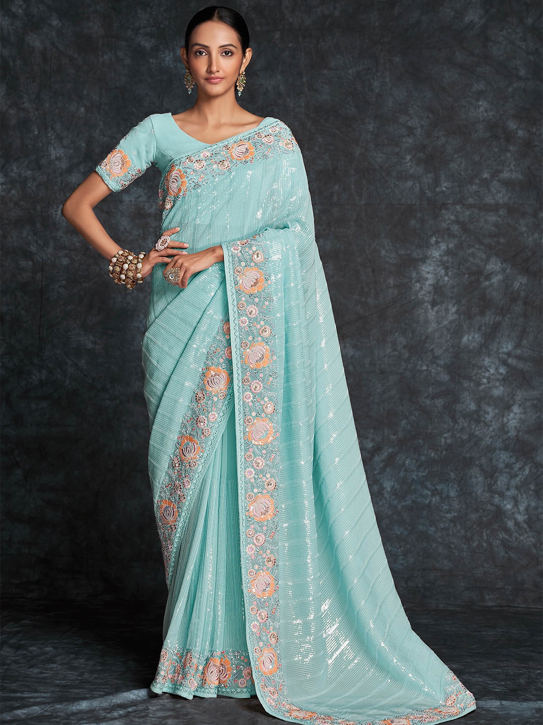 

Fusionic Floral Embroidered Embellished Pure Georgette Saree, Blue