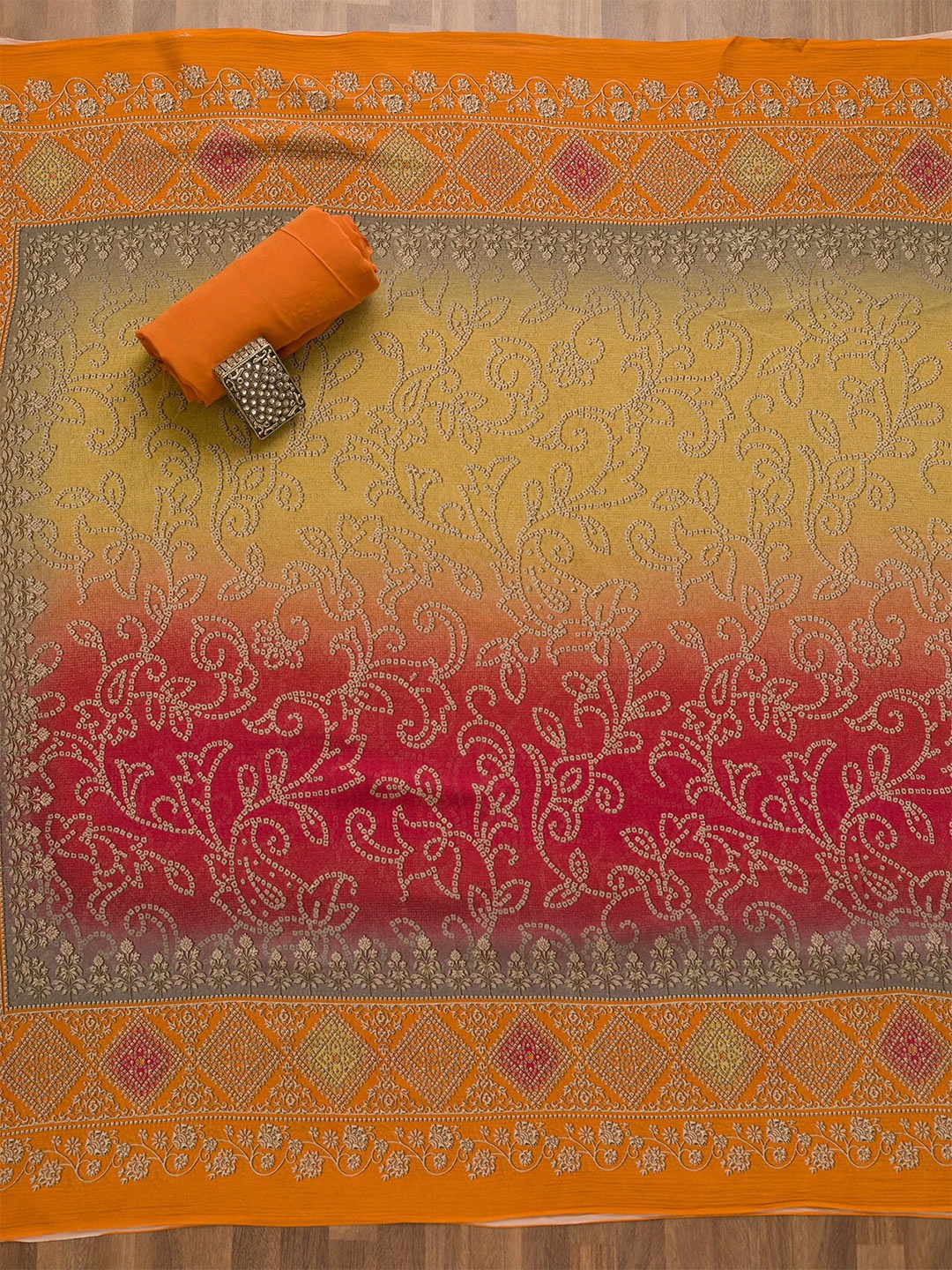 

Koskii Bandhani Printed Semi-Stitched Dress Material, Orange