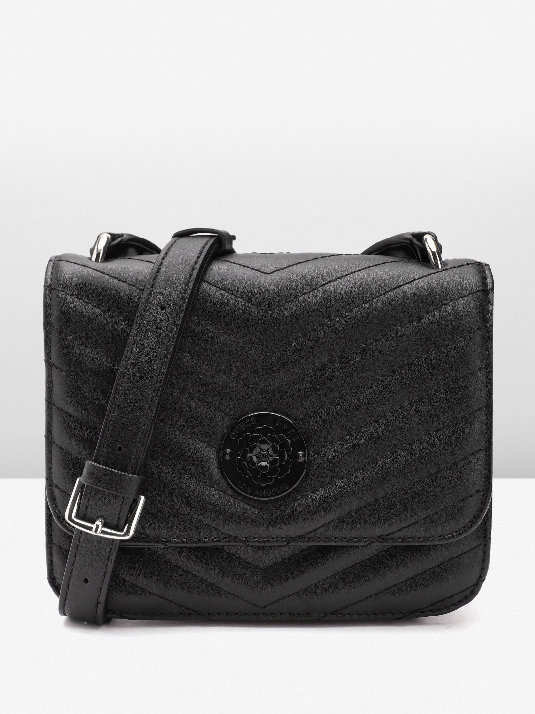 

GUESS Women Quilted Textured Structured Sling Bag, Black
