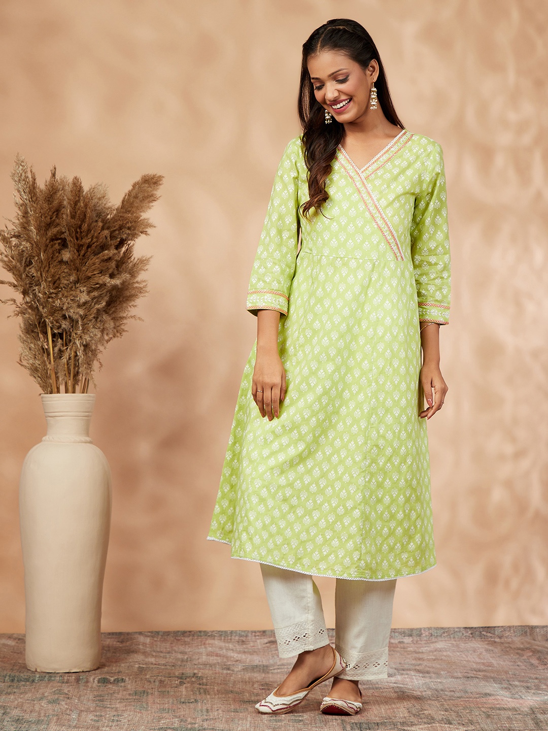 

IMARA Ethnic Motifs Printed V Neck Thread Work A-Line Pure Cotton Kurta, Lime green