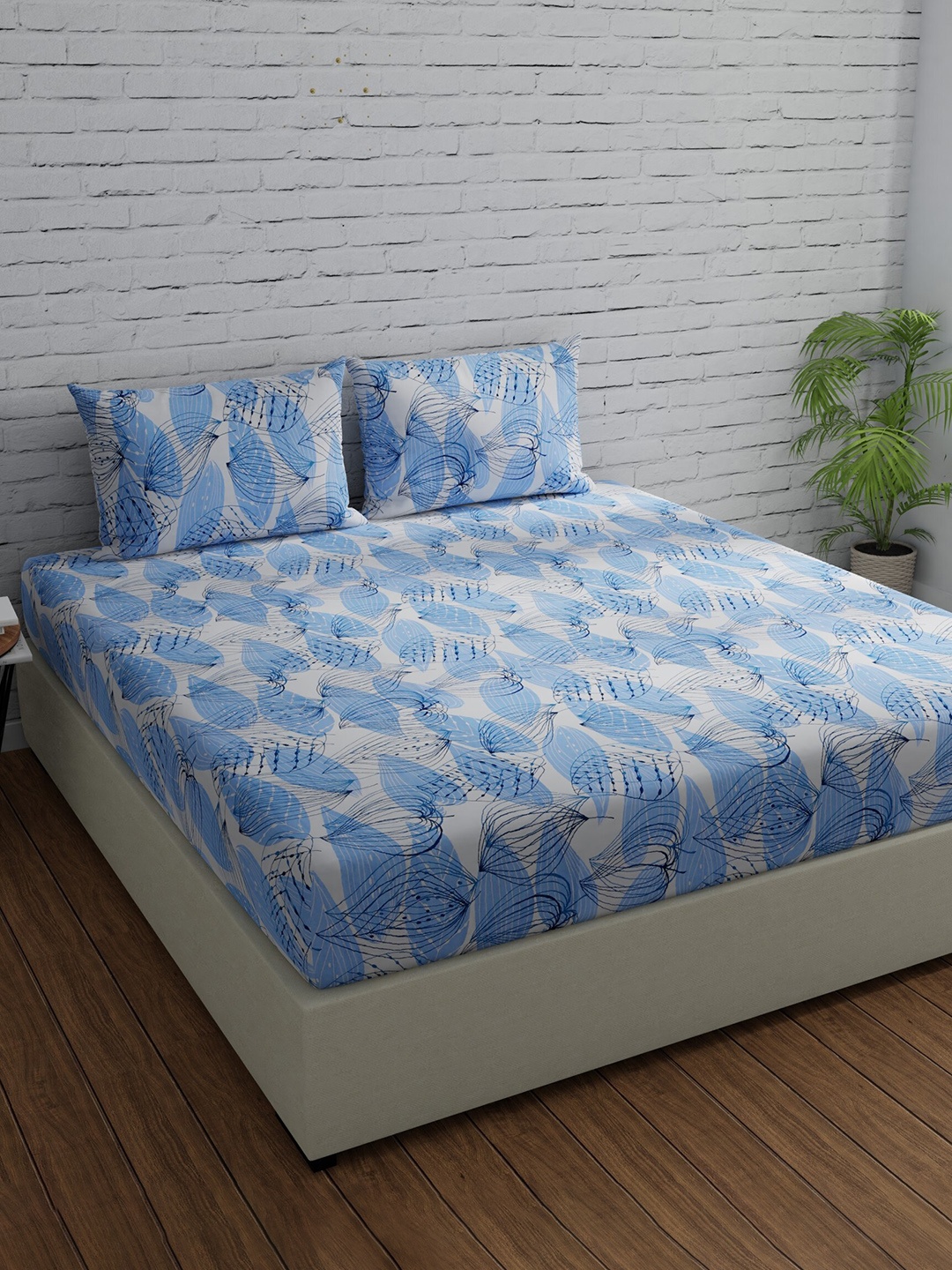 

Huesland Comfort White & Blue Printed 144 TC Cotton Queen Bedsheet with 2 Pillow Covers