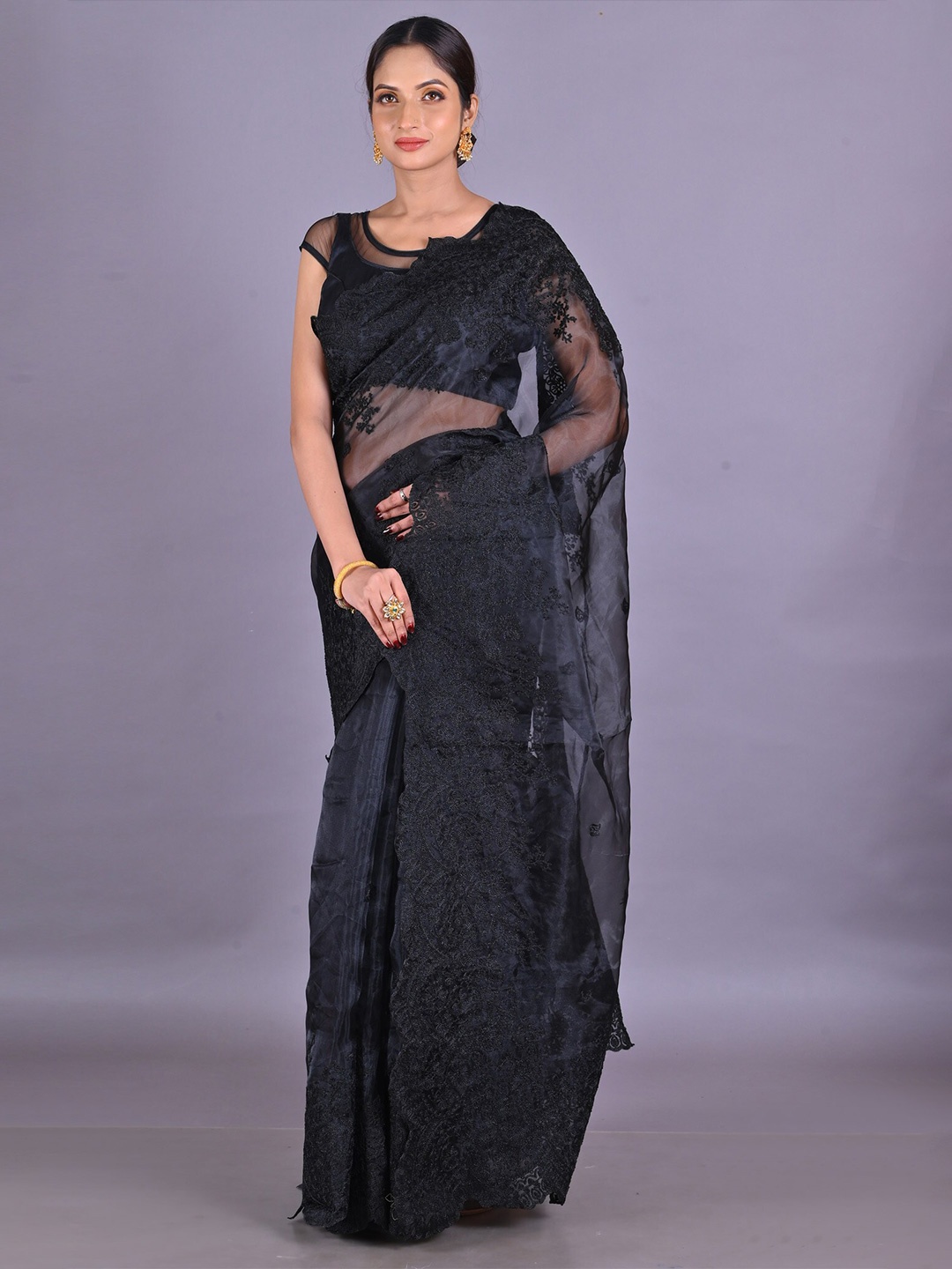 

Unnati Silks Black Floral Embroidered Organza Patola Saree