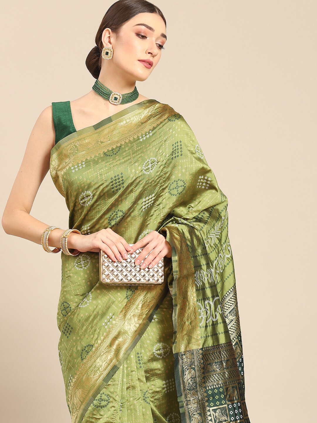 

all about you Green & Gold-Toned Ethnic Motif Woven Design Zari Kanjeevaram Saree