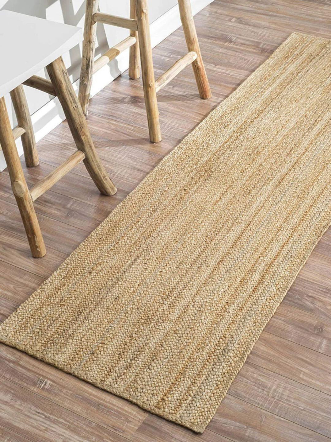 

THE HANDMADE FLAIR Beige Self-Design Floor Carpet