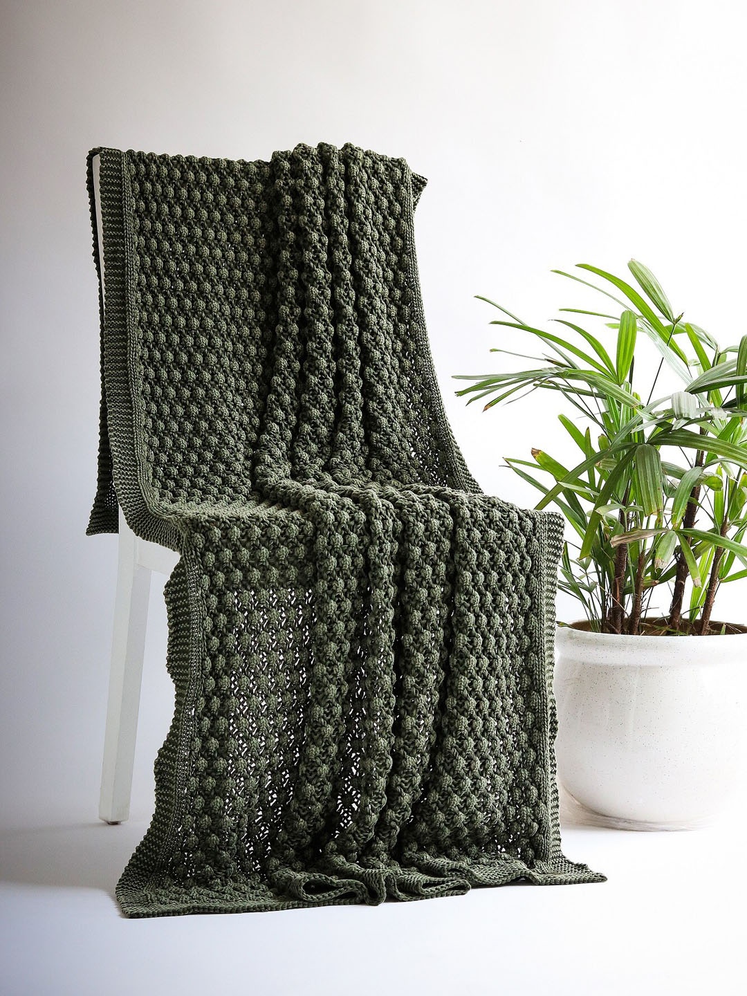 

Pluchi Green Self-Design Cotton Throw Blanket