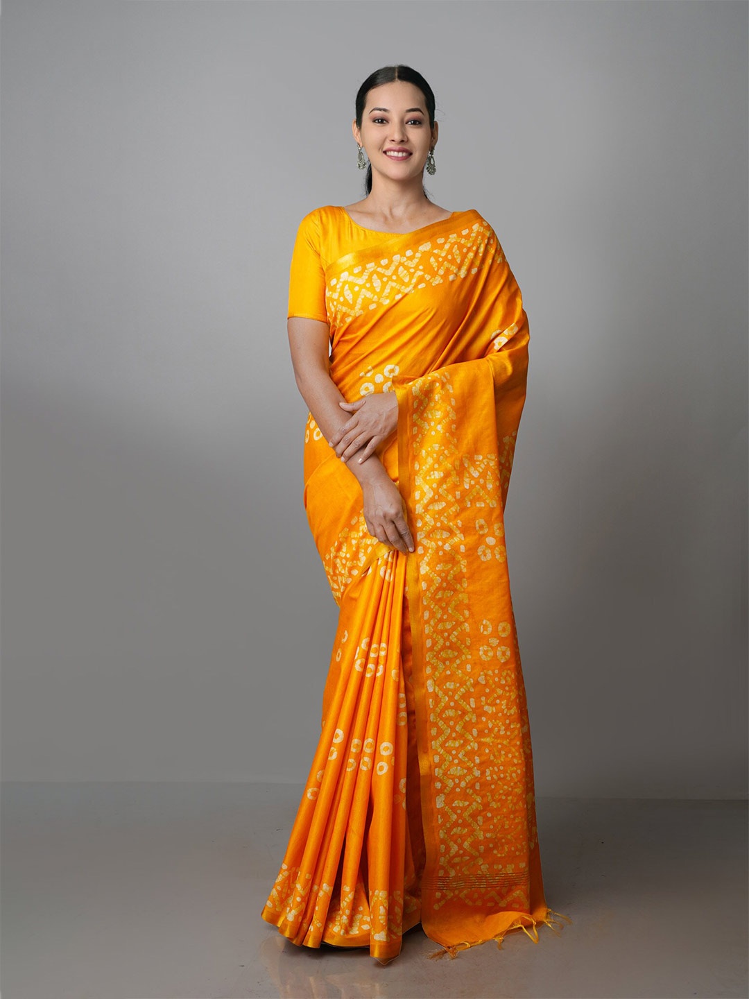 

Unnati Silks Batik Printed Zari Pure Silk Handloom Chanderi Saree, Yellow