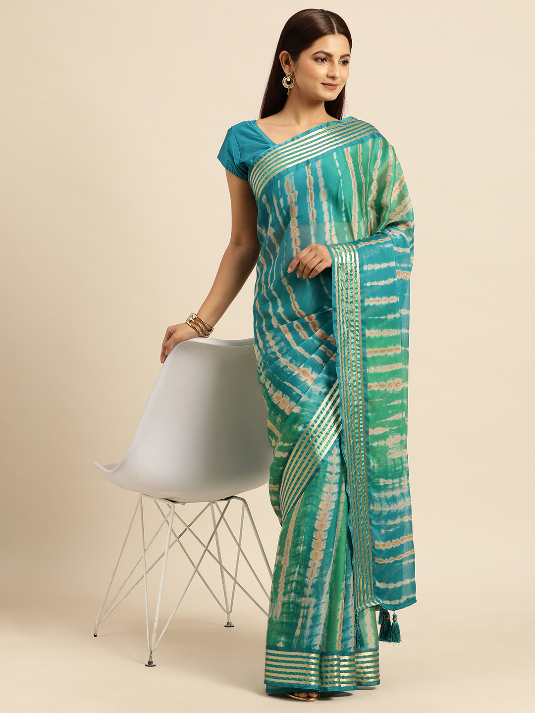 

Triveni Striped Embroidered Pure Chiffon Saree, Green
