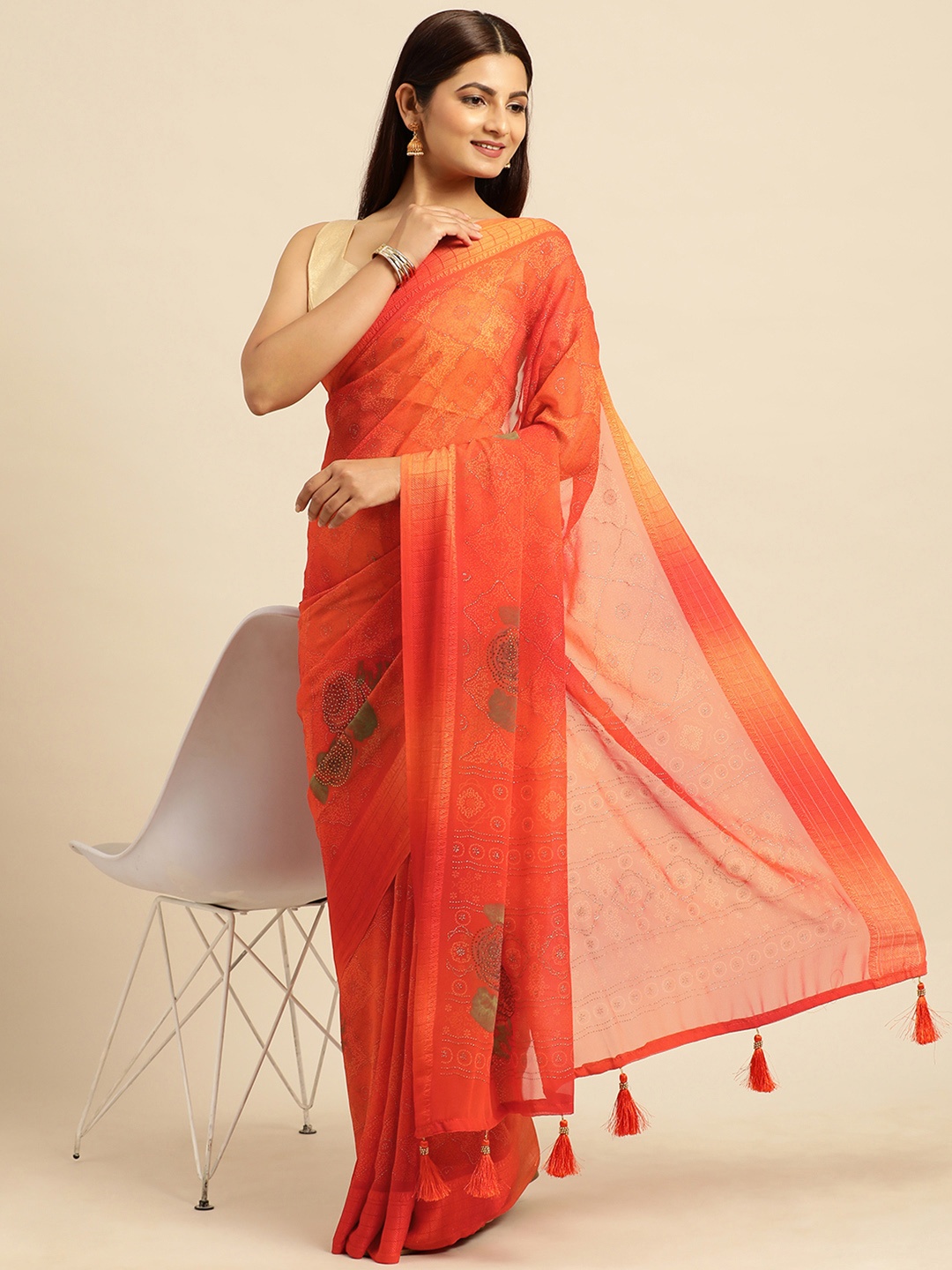 

Triveni Floral Printed Stones-Studded Pure Georgette Saree, Orange