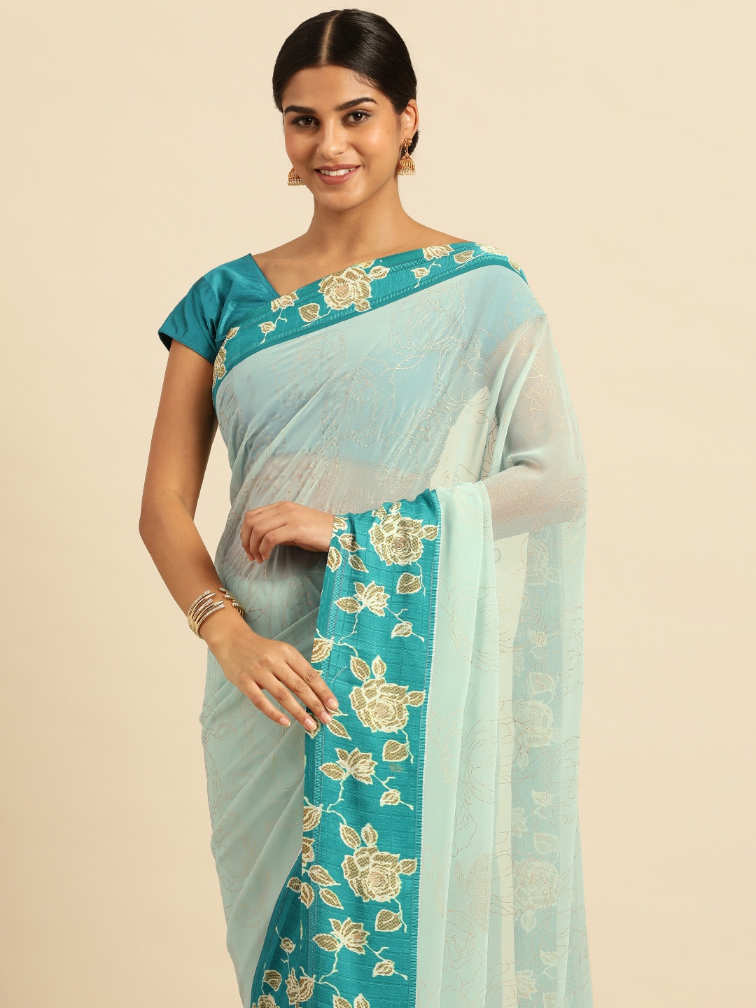 

Triveni Floral Pure Georgette Saree, Blue
