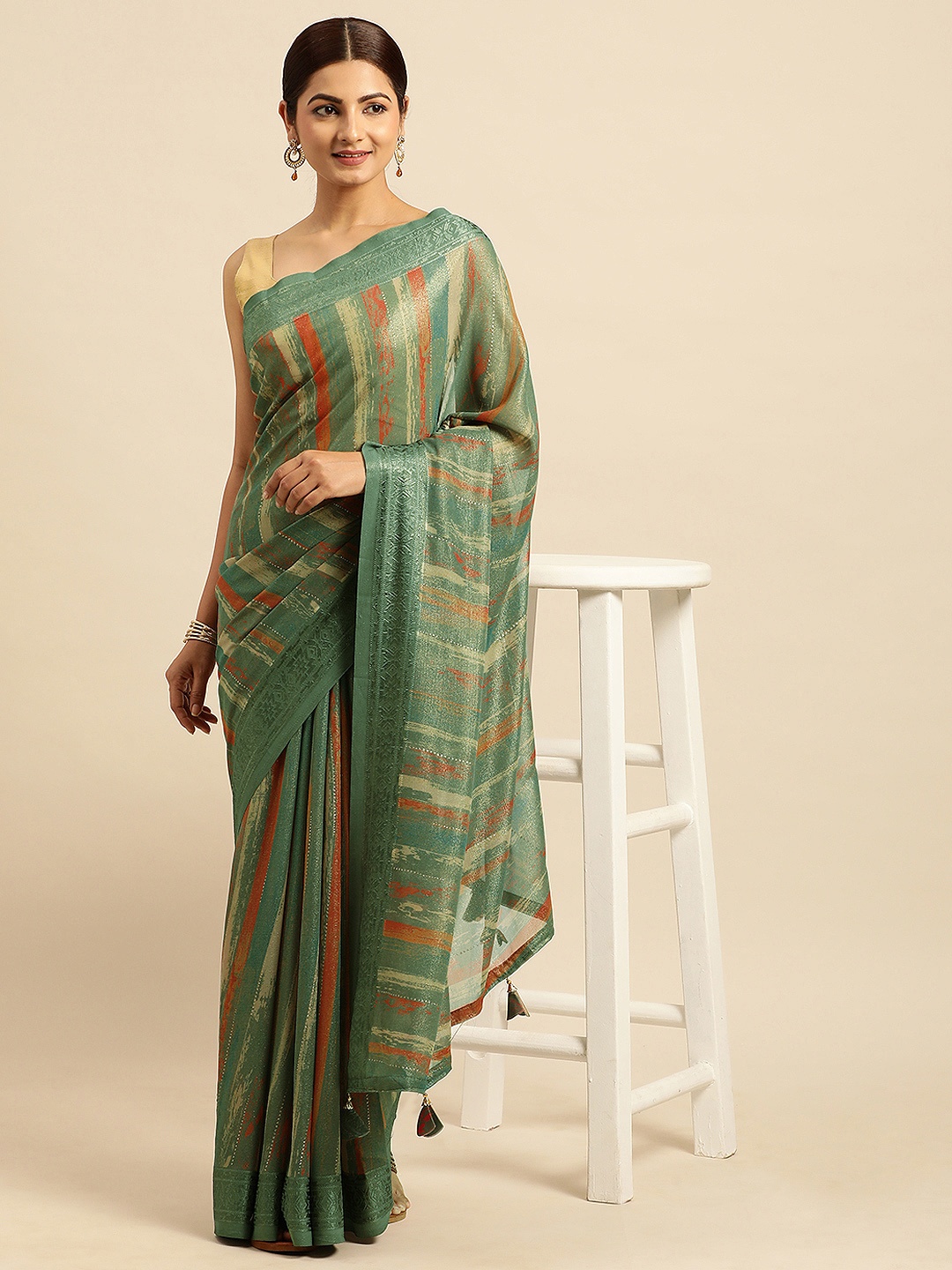 

Triveni Stones-Studded Pure Georgette Saree, Green