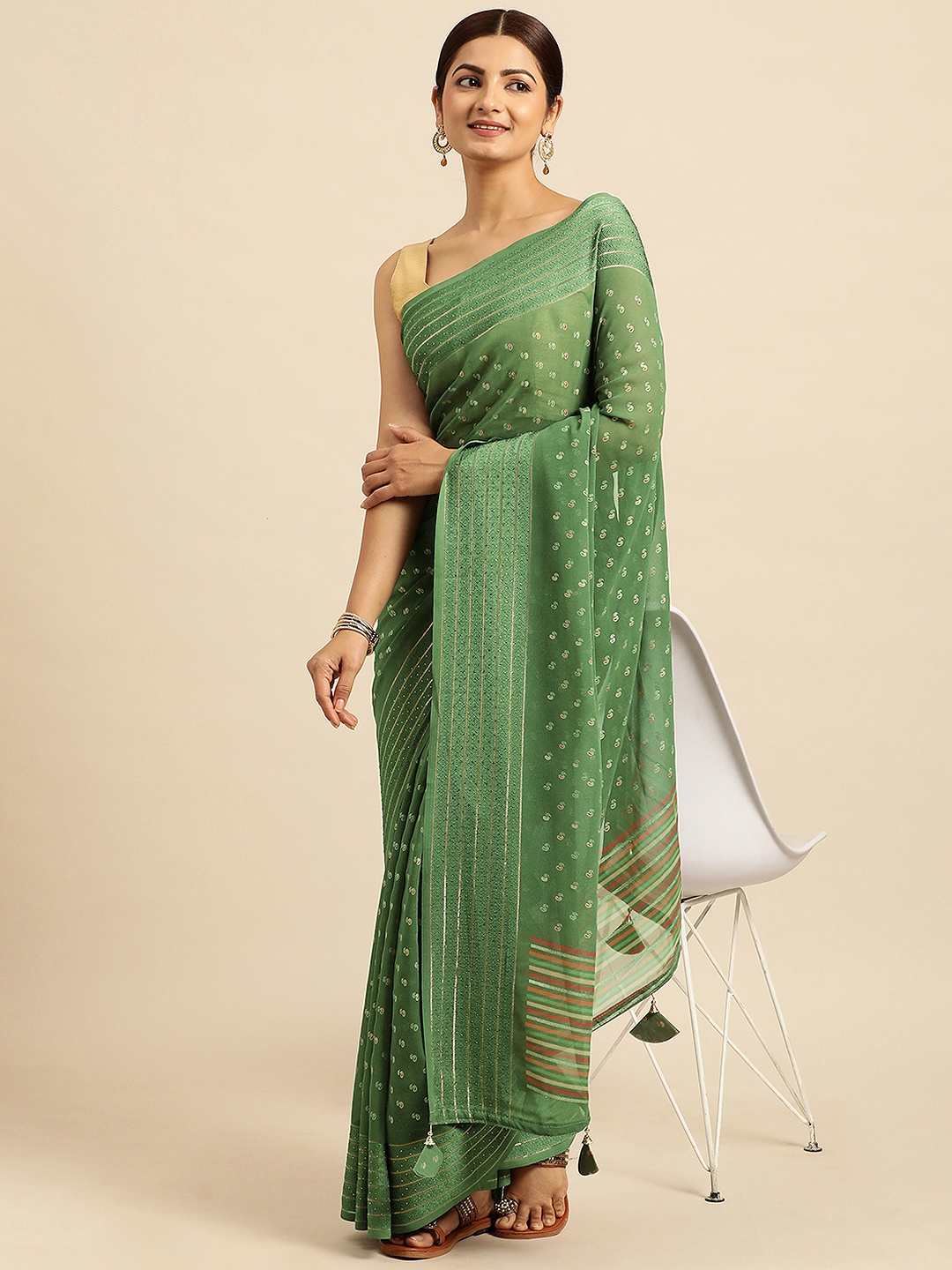 

Triveni Ethnic Motifs Pure Georgette Saree, Green
