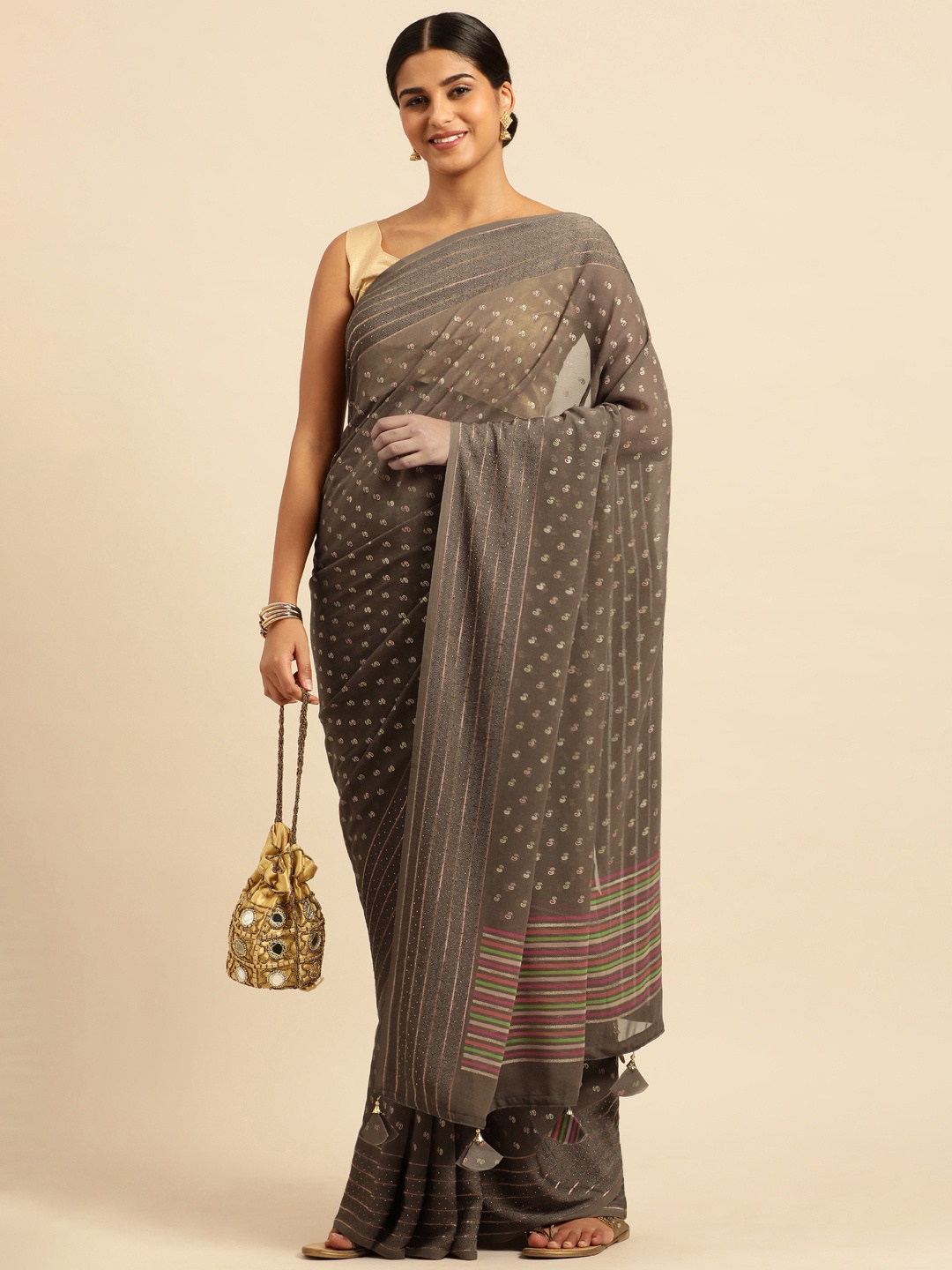 

Triveni Ethnic Motifs Stones-Studded Pure Georgette Saree, Grey
